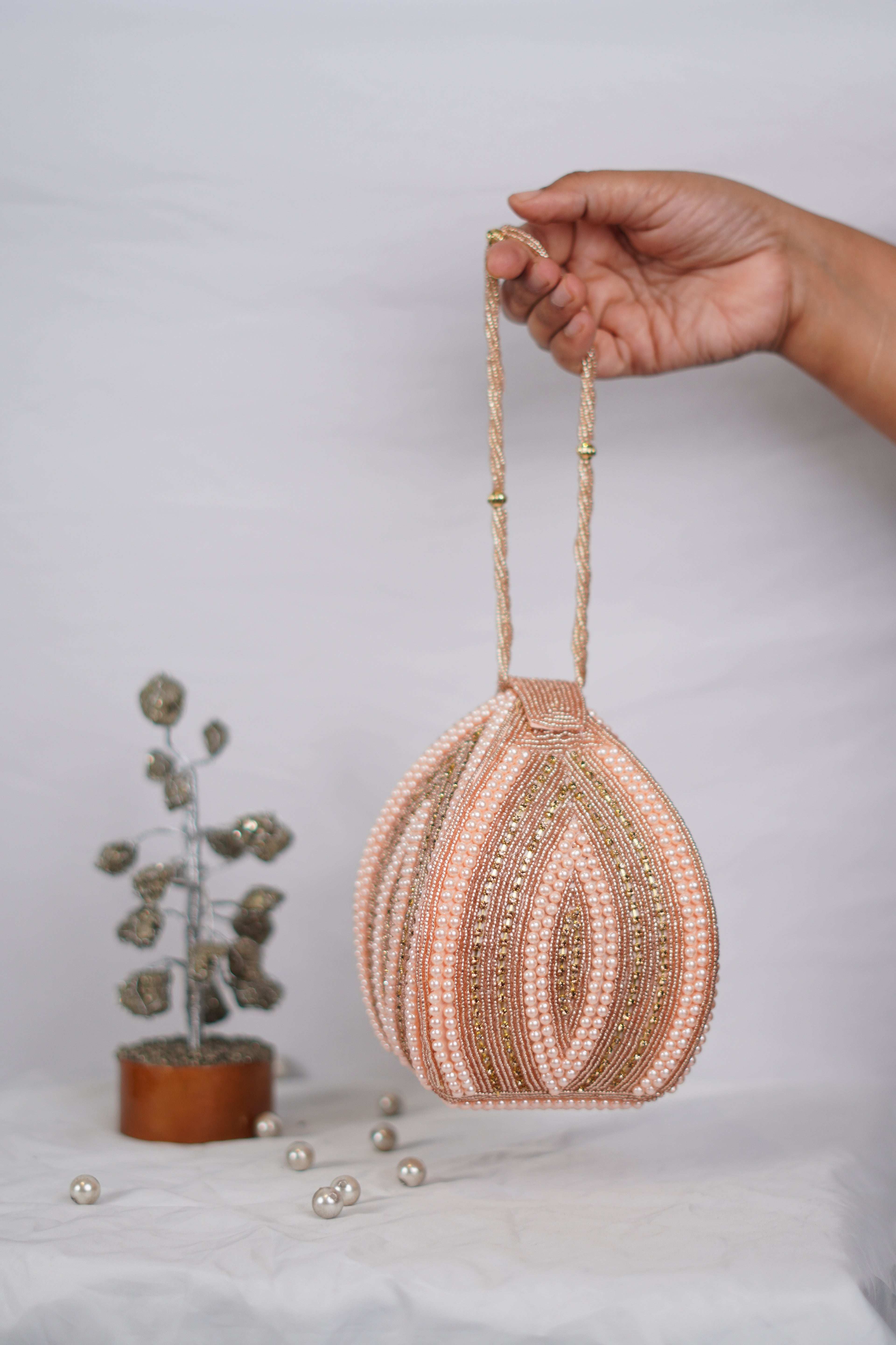 Handcrafted Coconut-Shaped Beaded Wristlet Potli