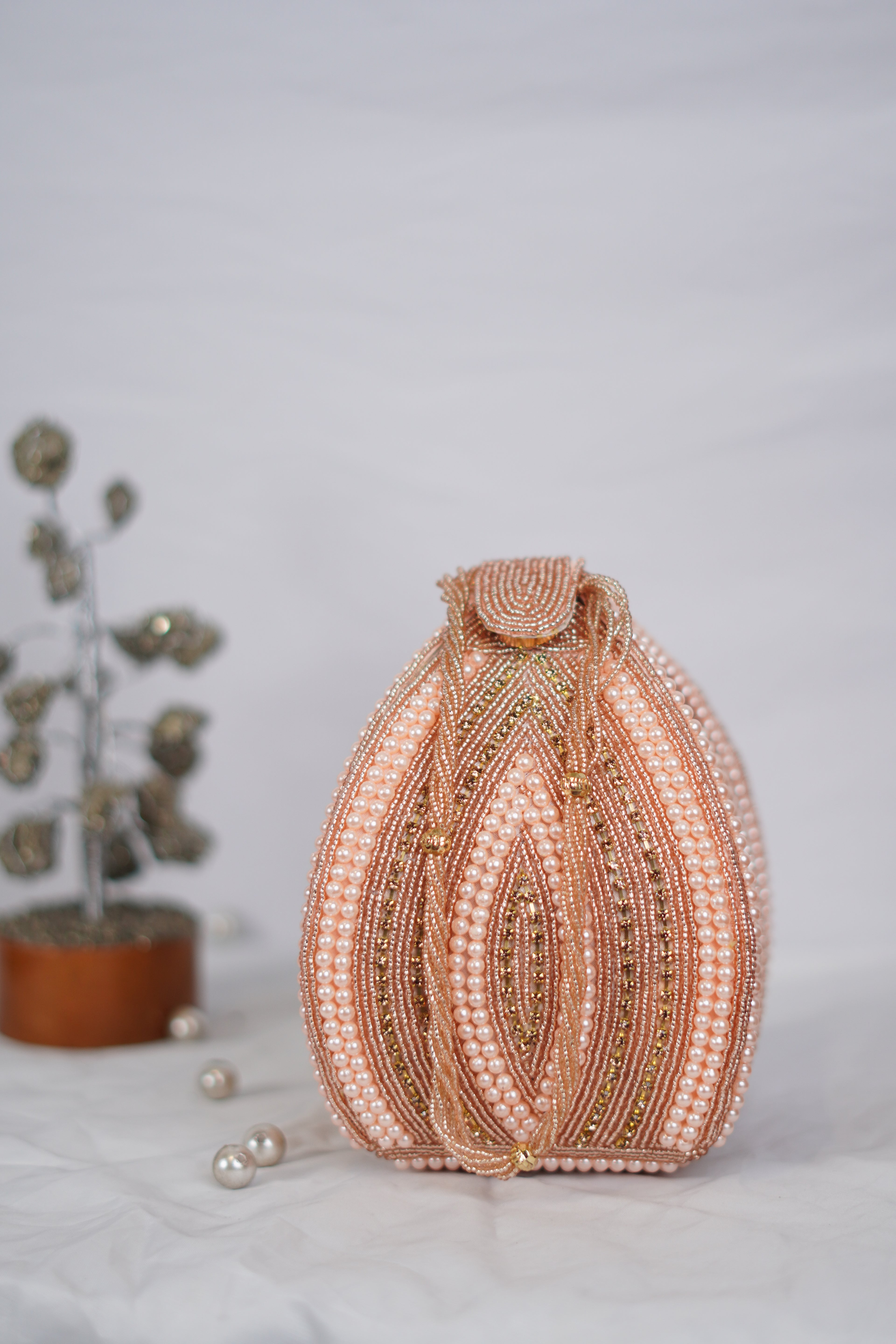 Handcrafted Coconut-Shaped Beaded Wristlet Potli