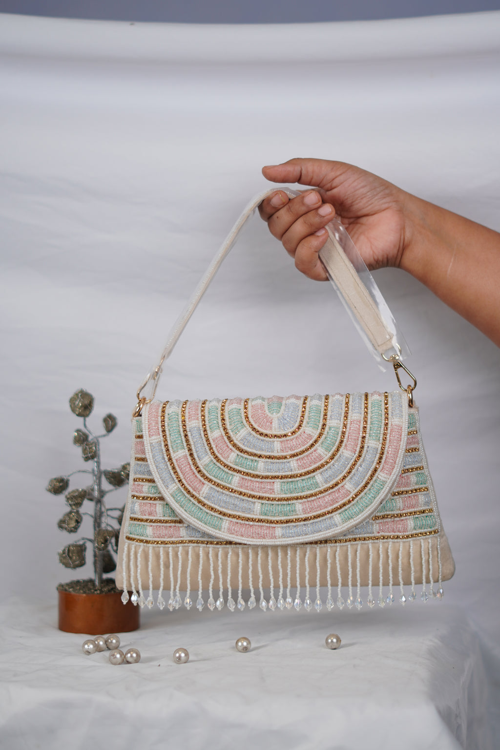 Partywear handbag with beaded tassels