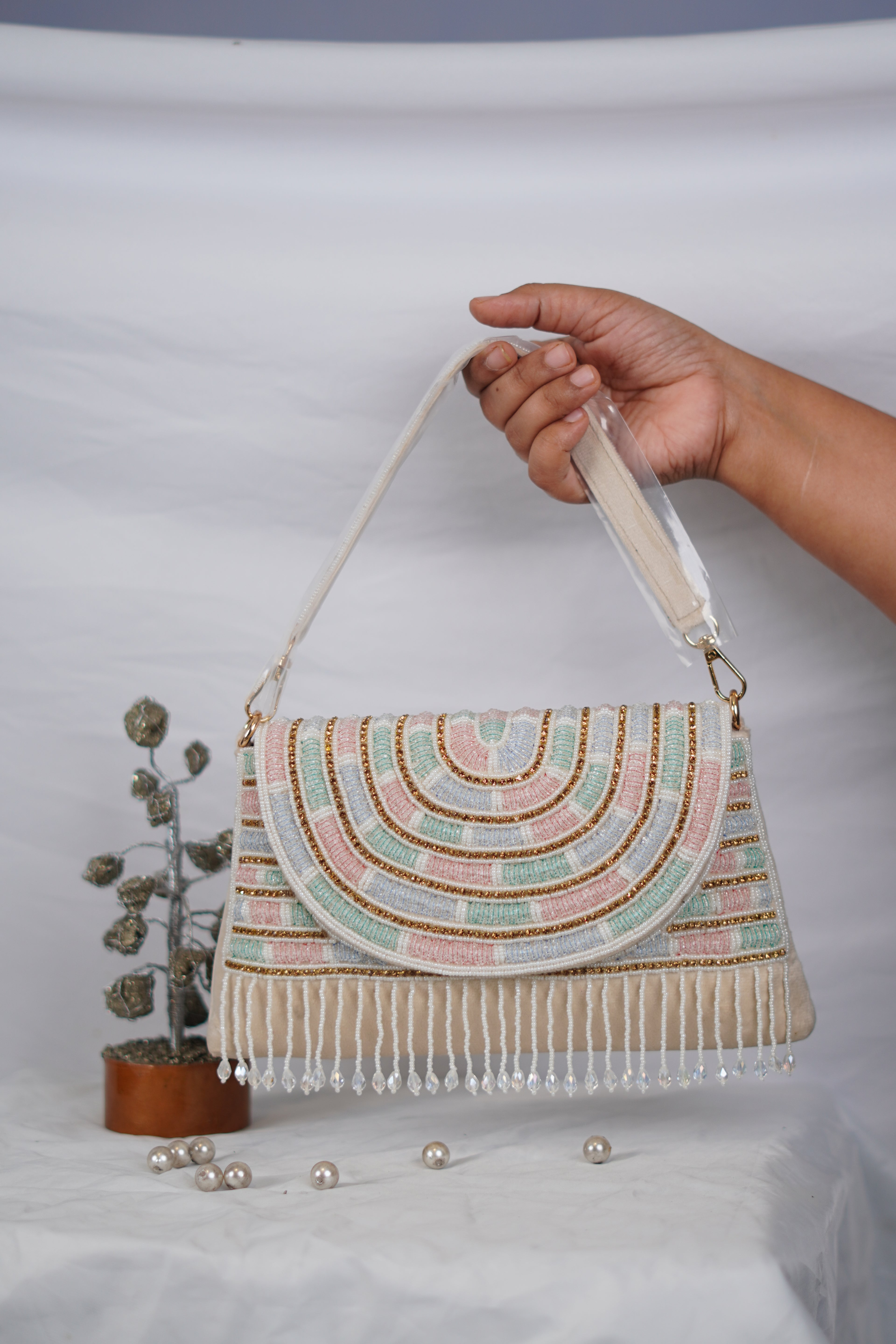 Partywear handbag with beaded tassels