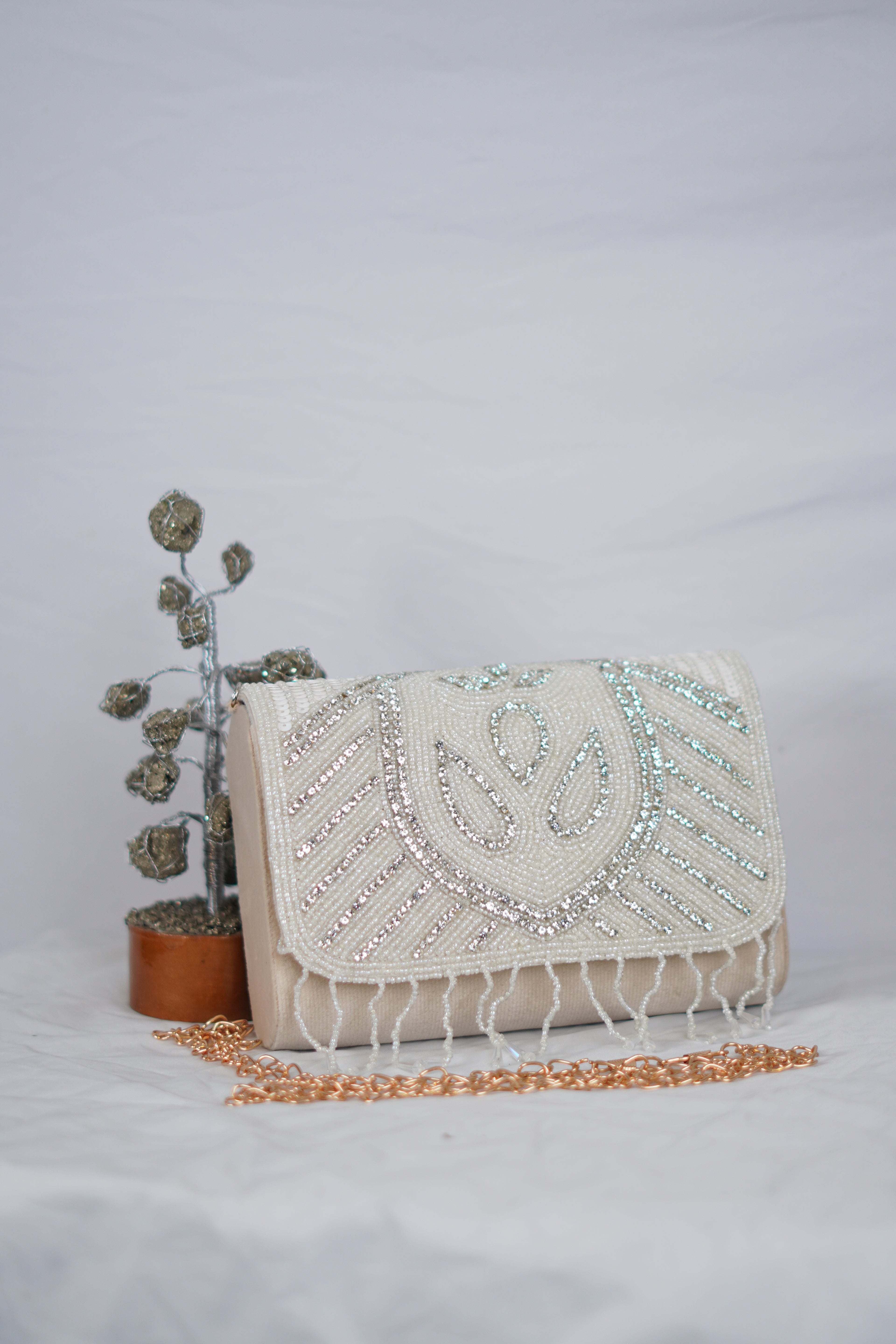 White Beaded clutch with tassels