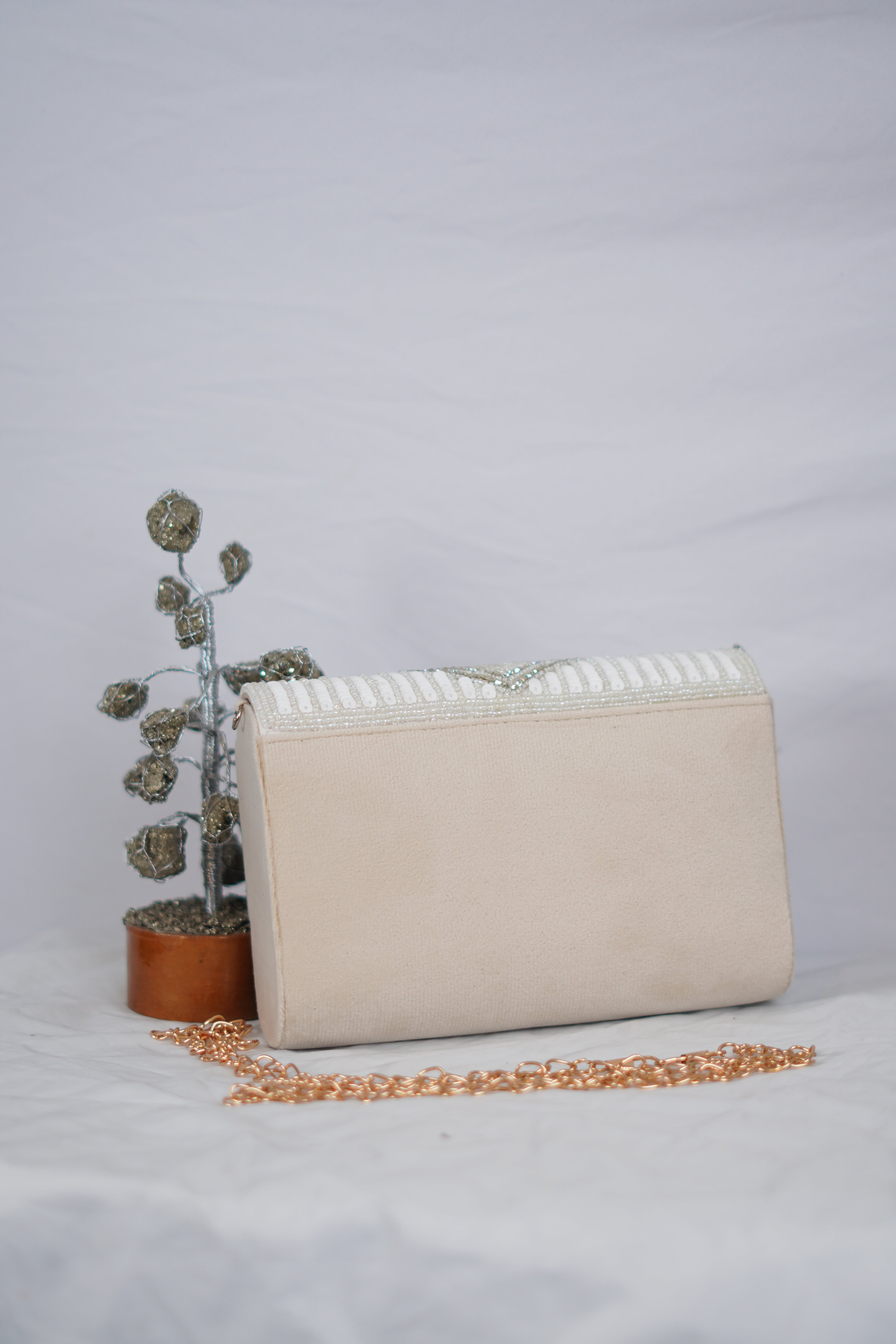 White Beaded clutch with tassels