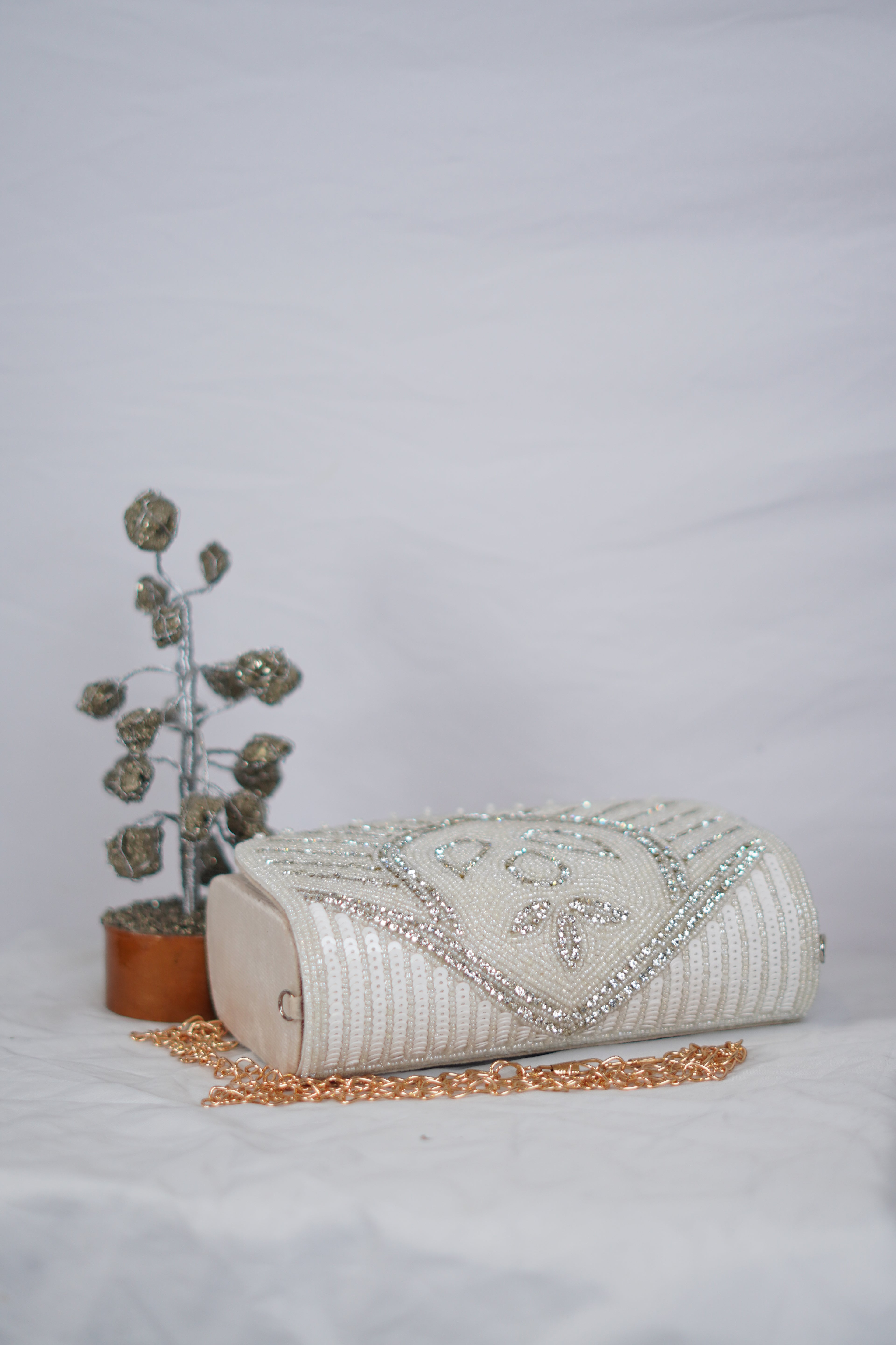 White Beaded clutch with tassels