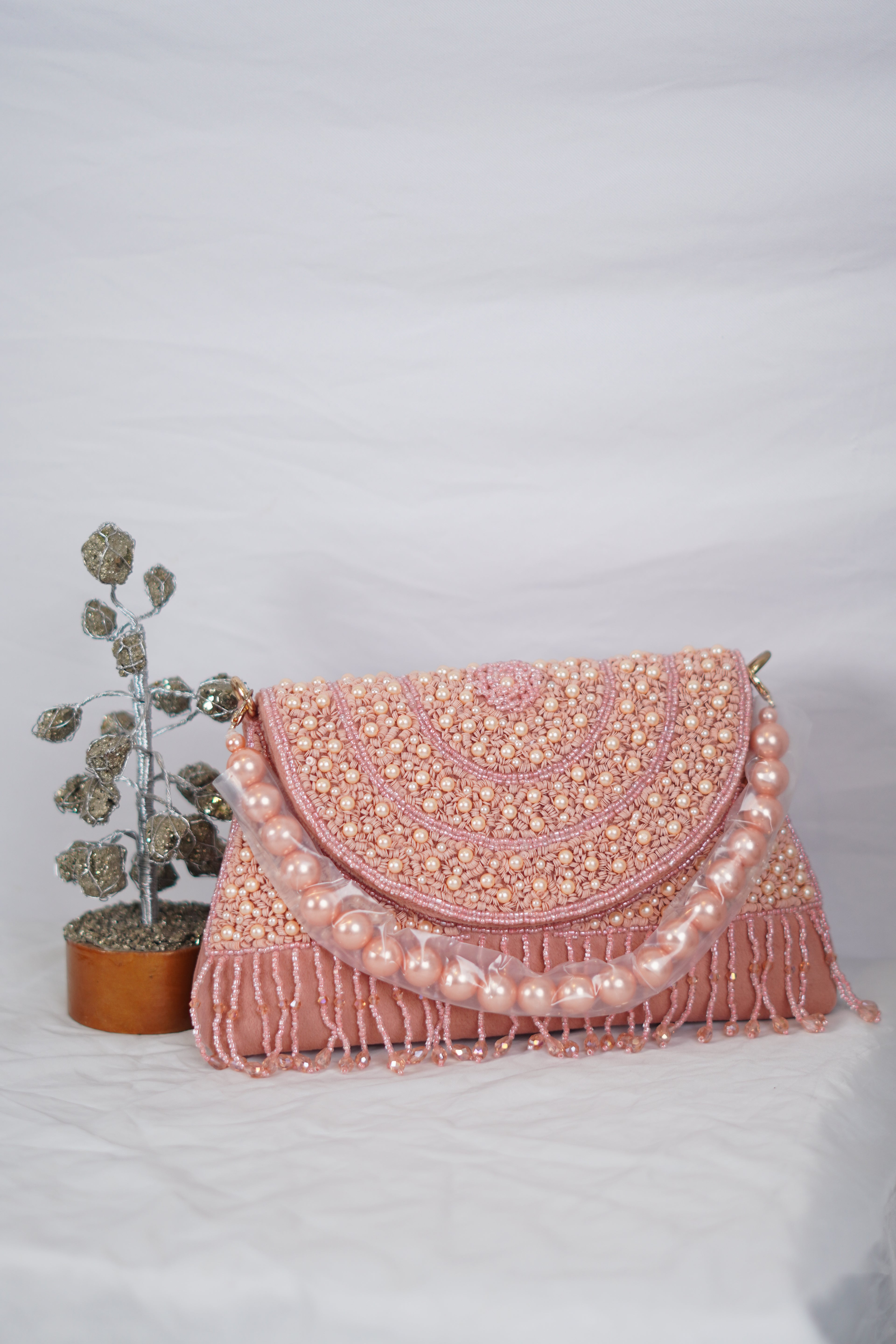 Partywear bag with beaded handle
