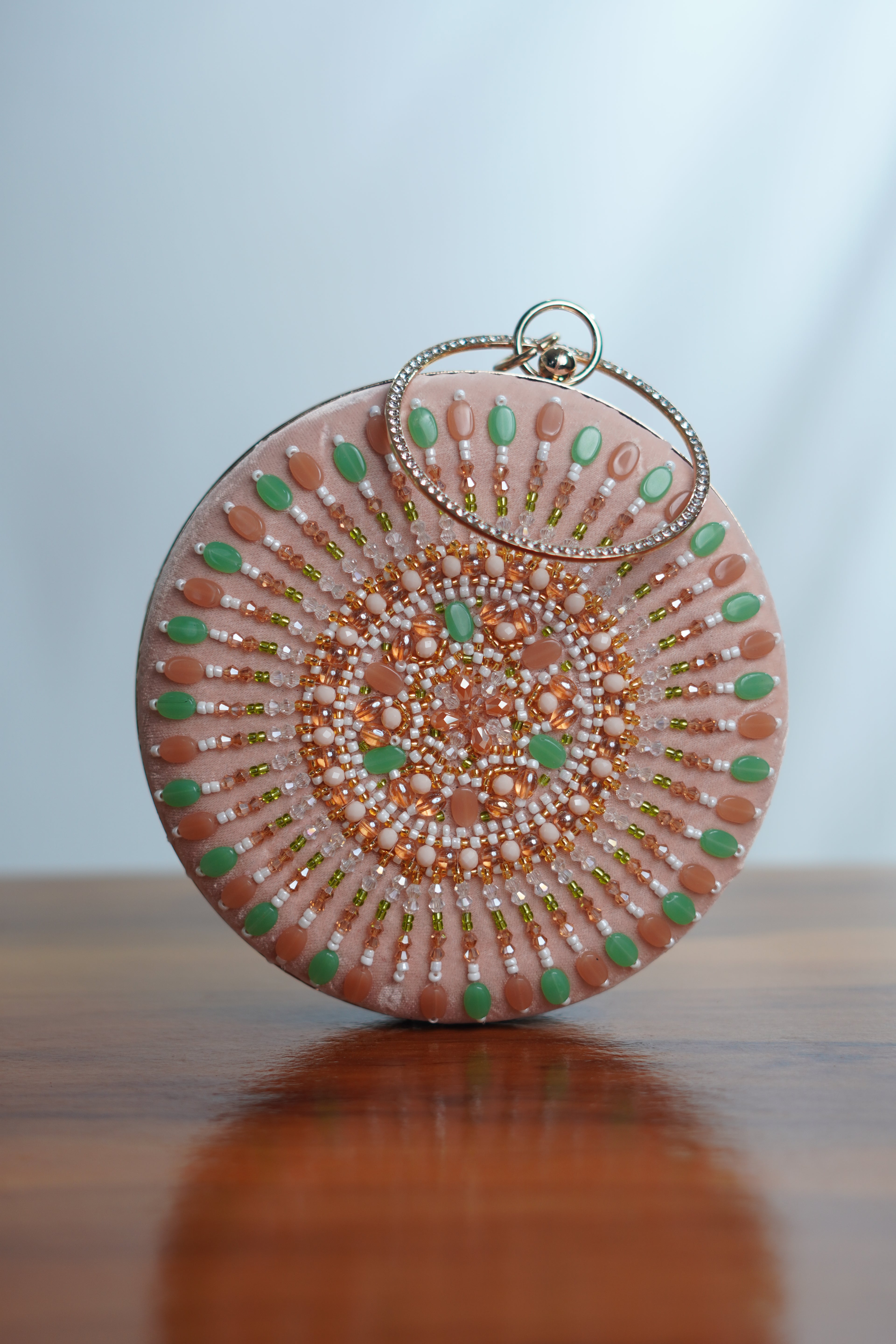 Circular shaped clutch bag , pink