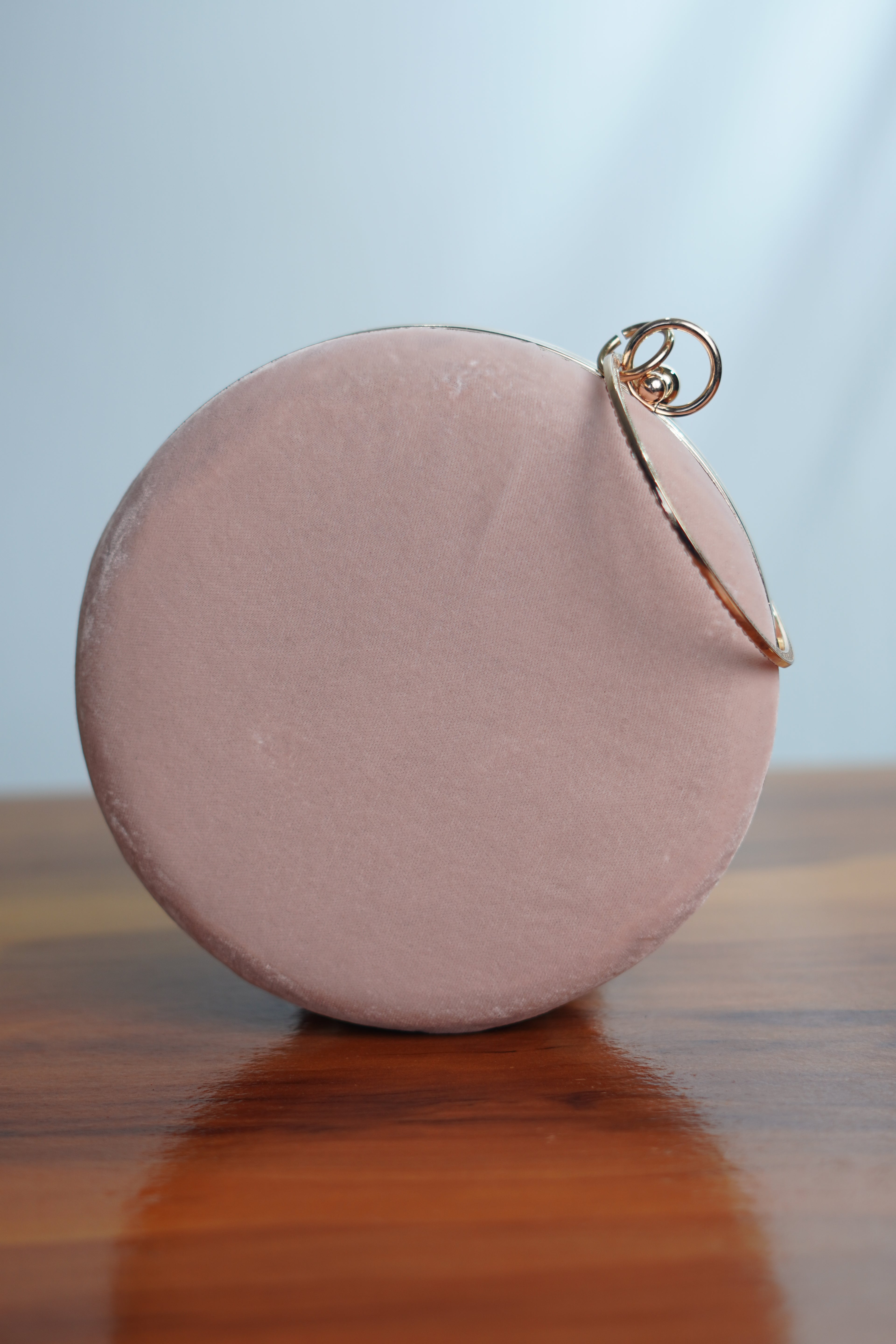 Circular shaped clutch bag , pink