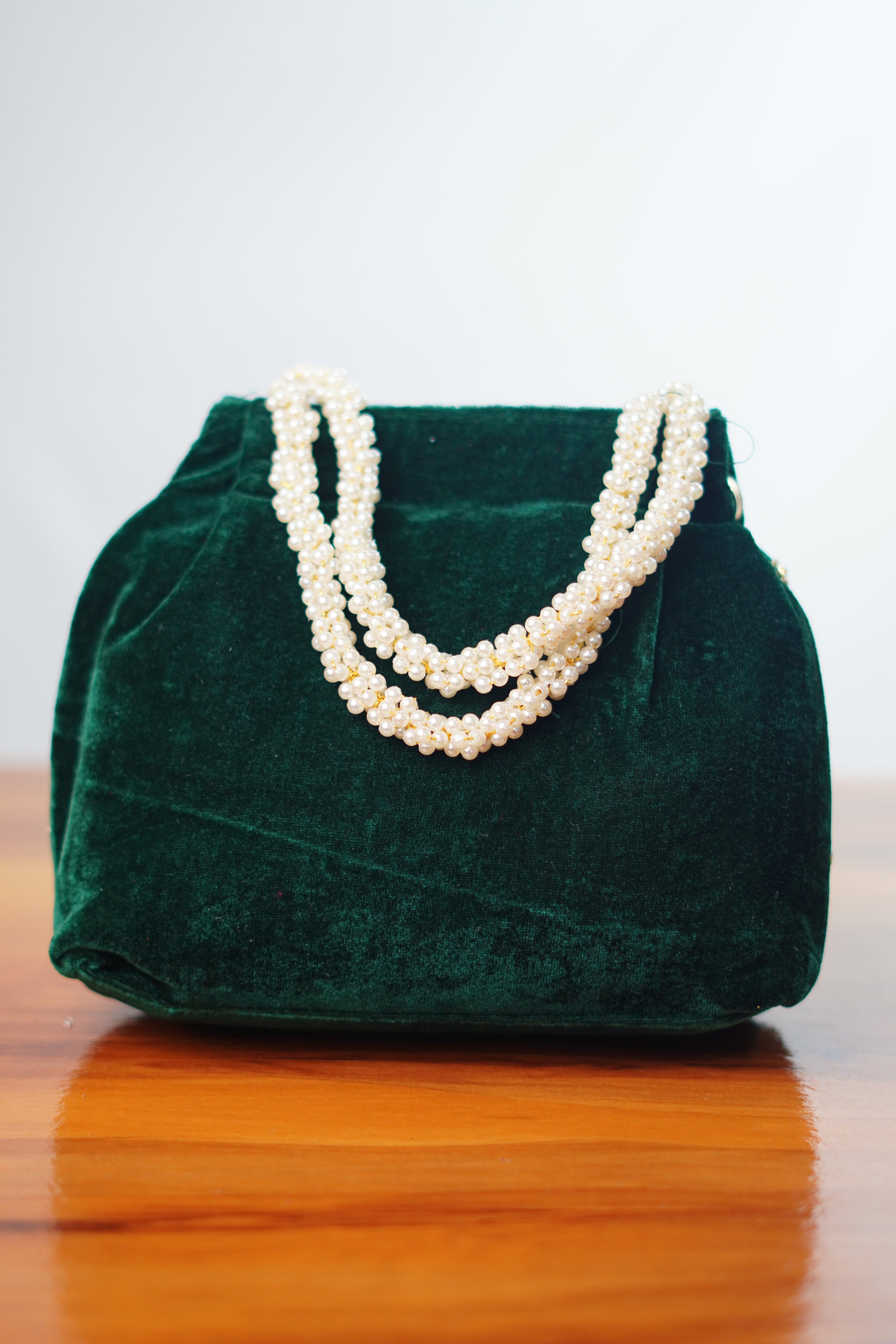 Velvet potli shaped party bags with beads