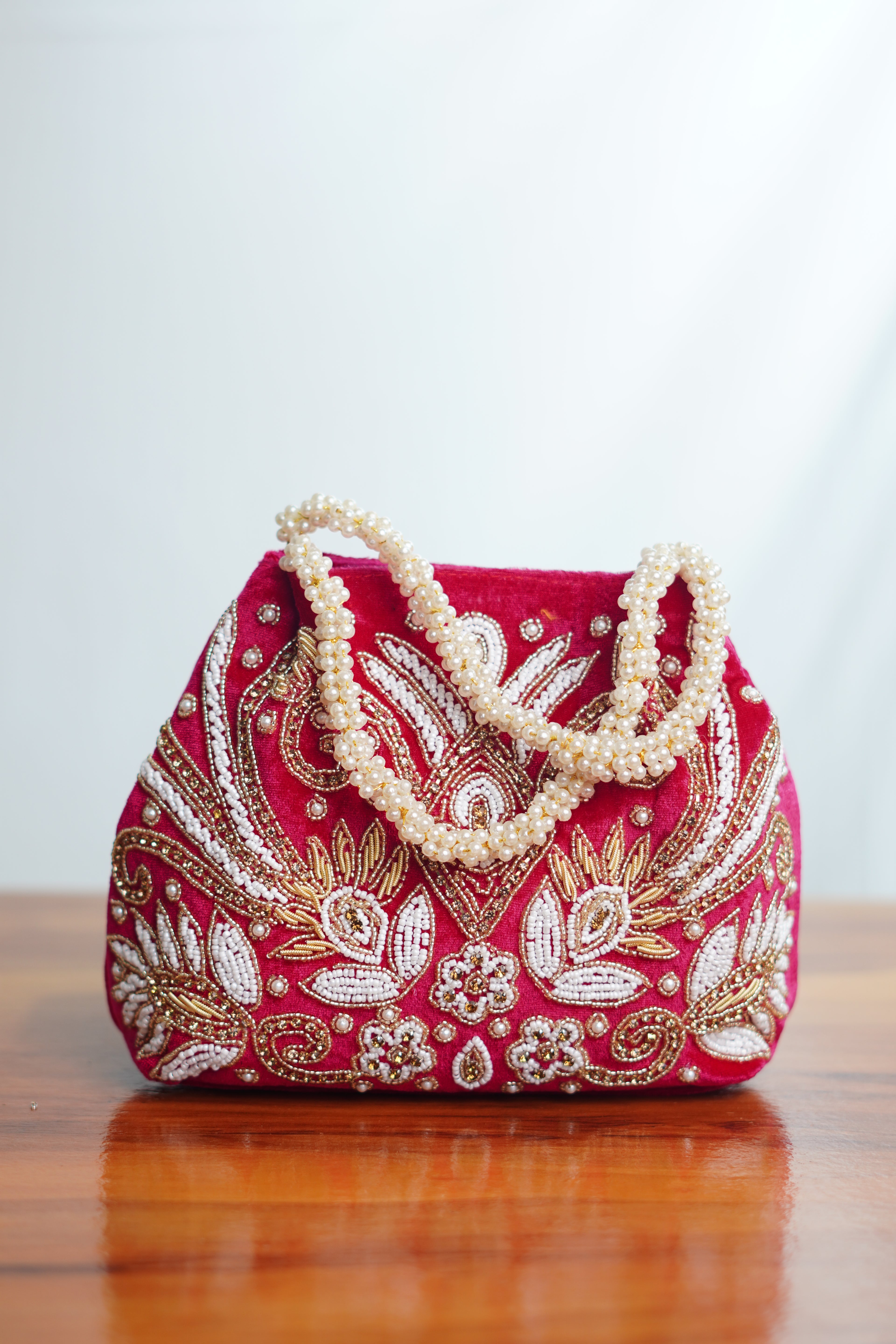 Velvet potli shaped party bags with beads