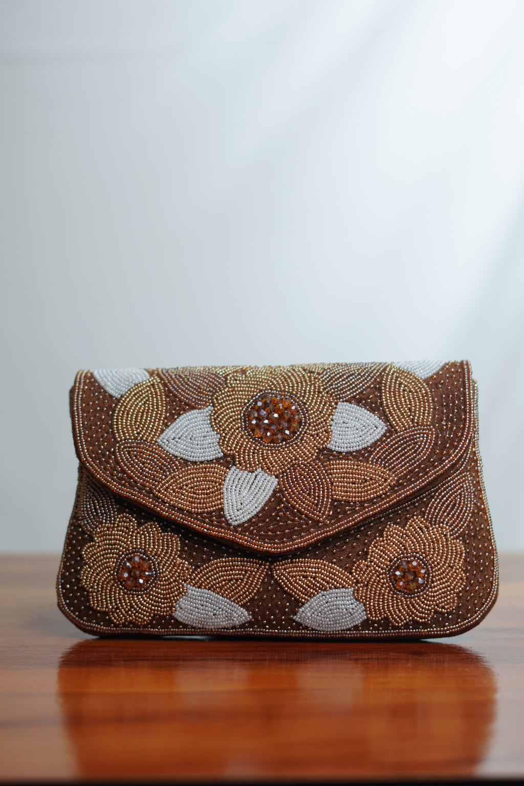Brown clutch with beads work