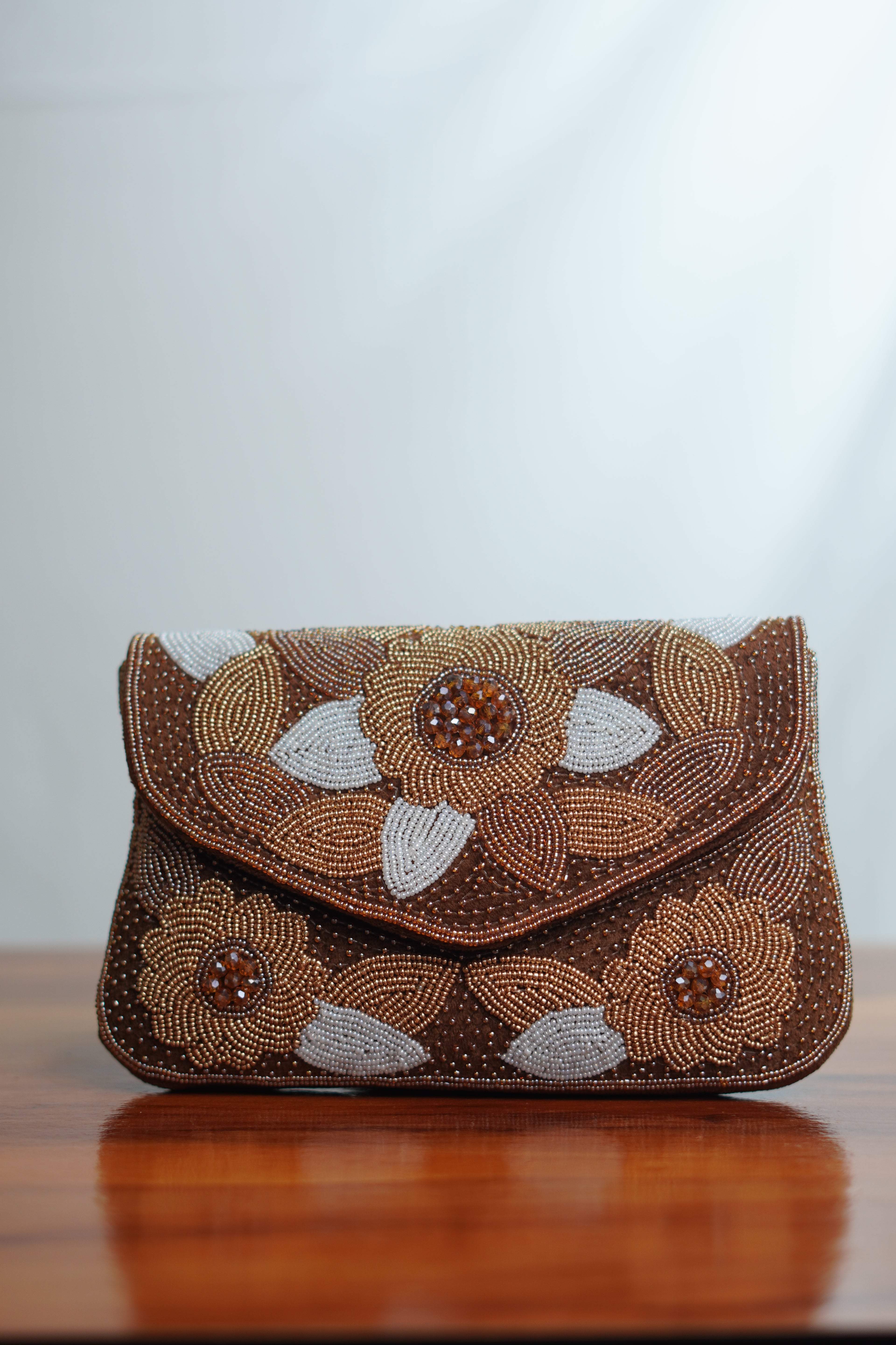Brown clutch with beads work