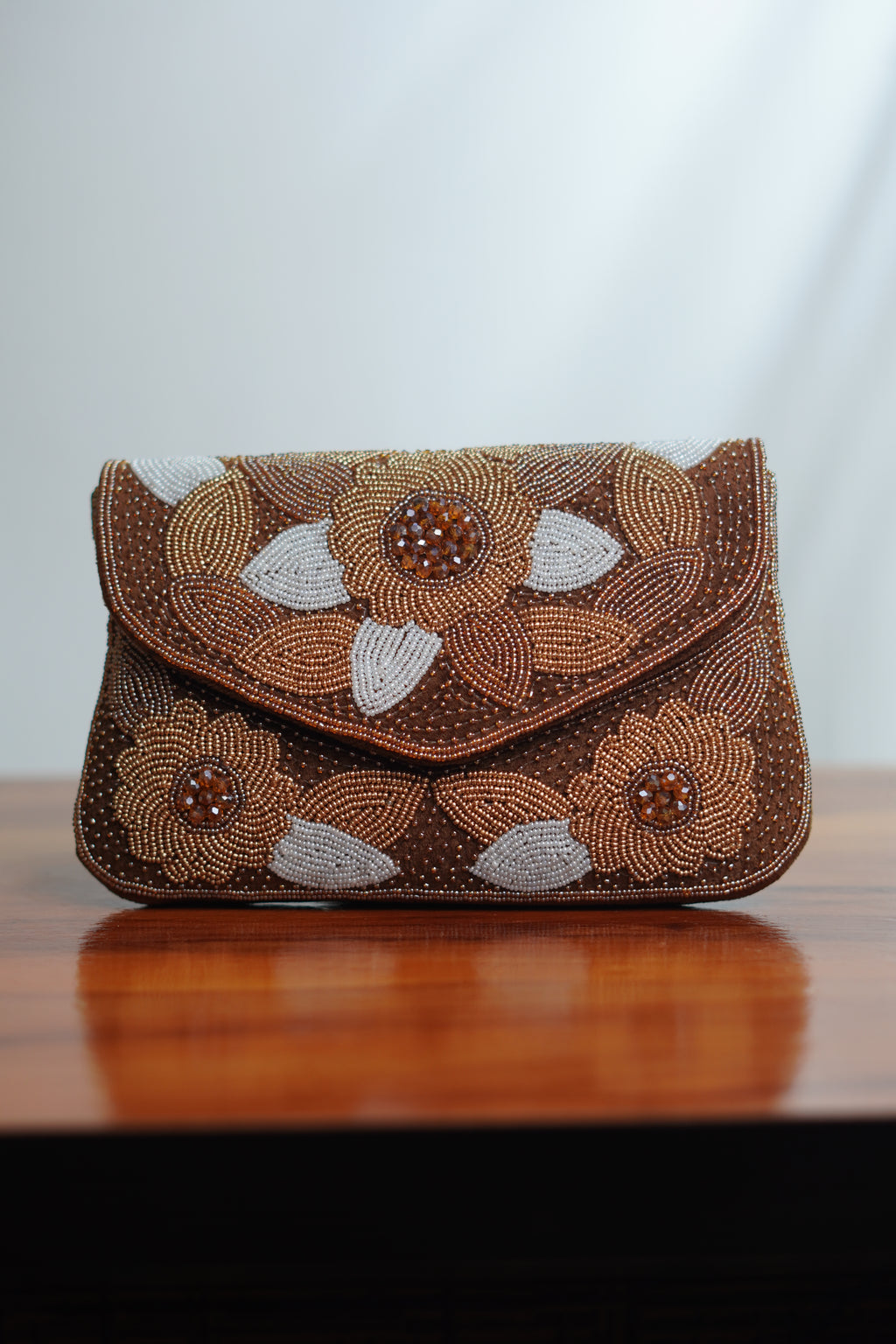 Brown clutch with beads work