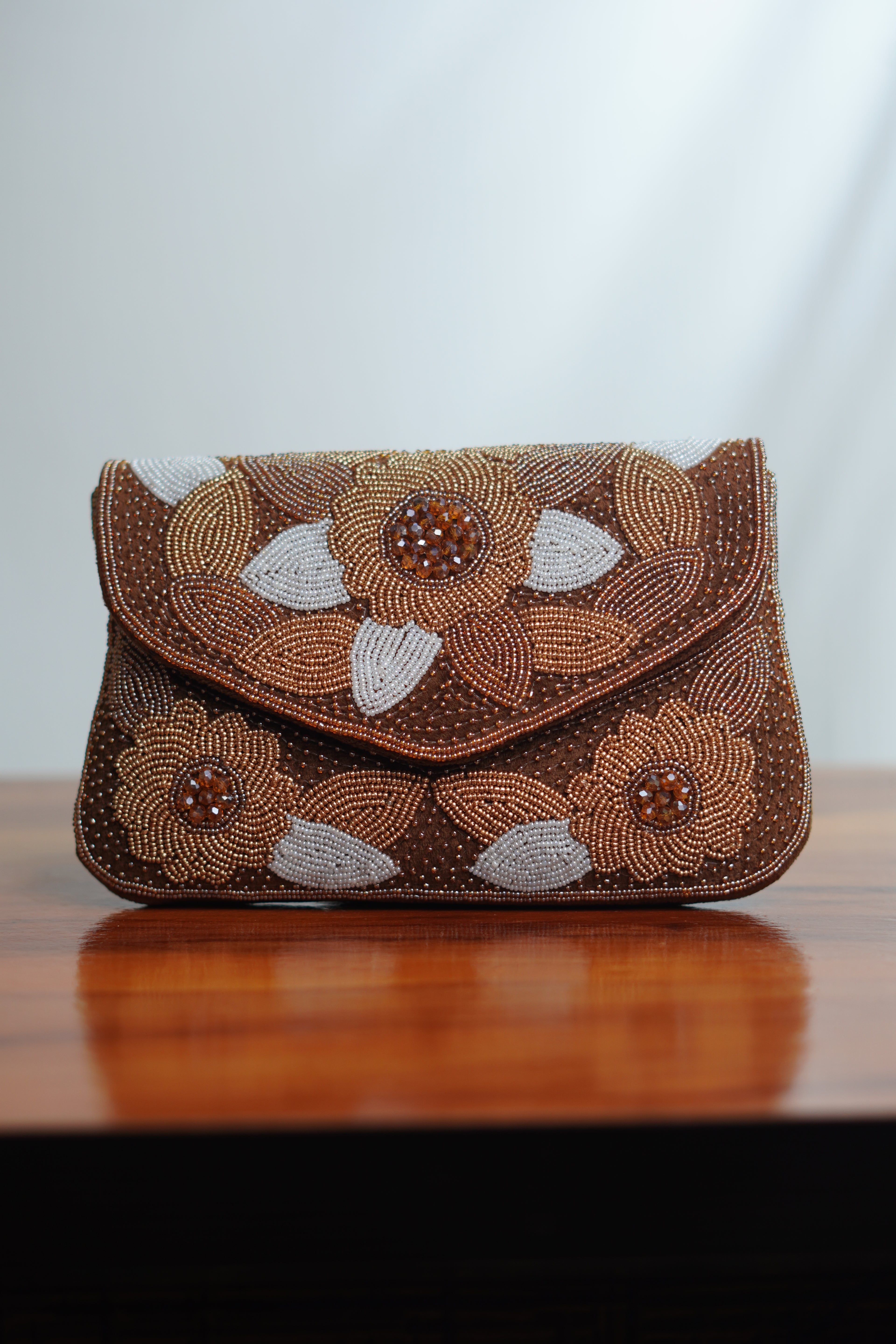Brown clutch with beads work