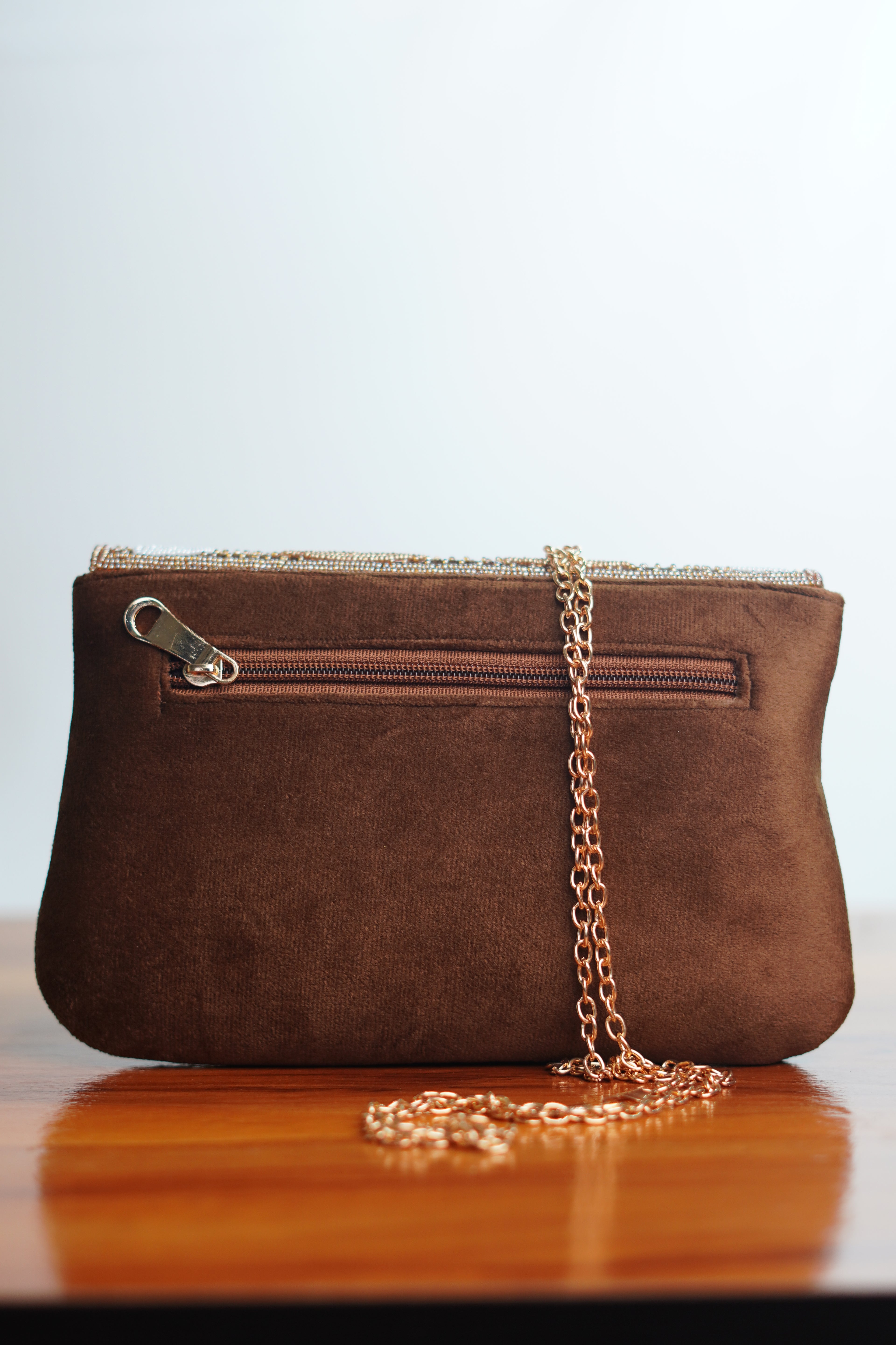 Brown clutch with beads work