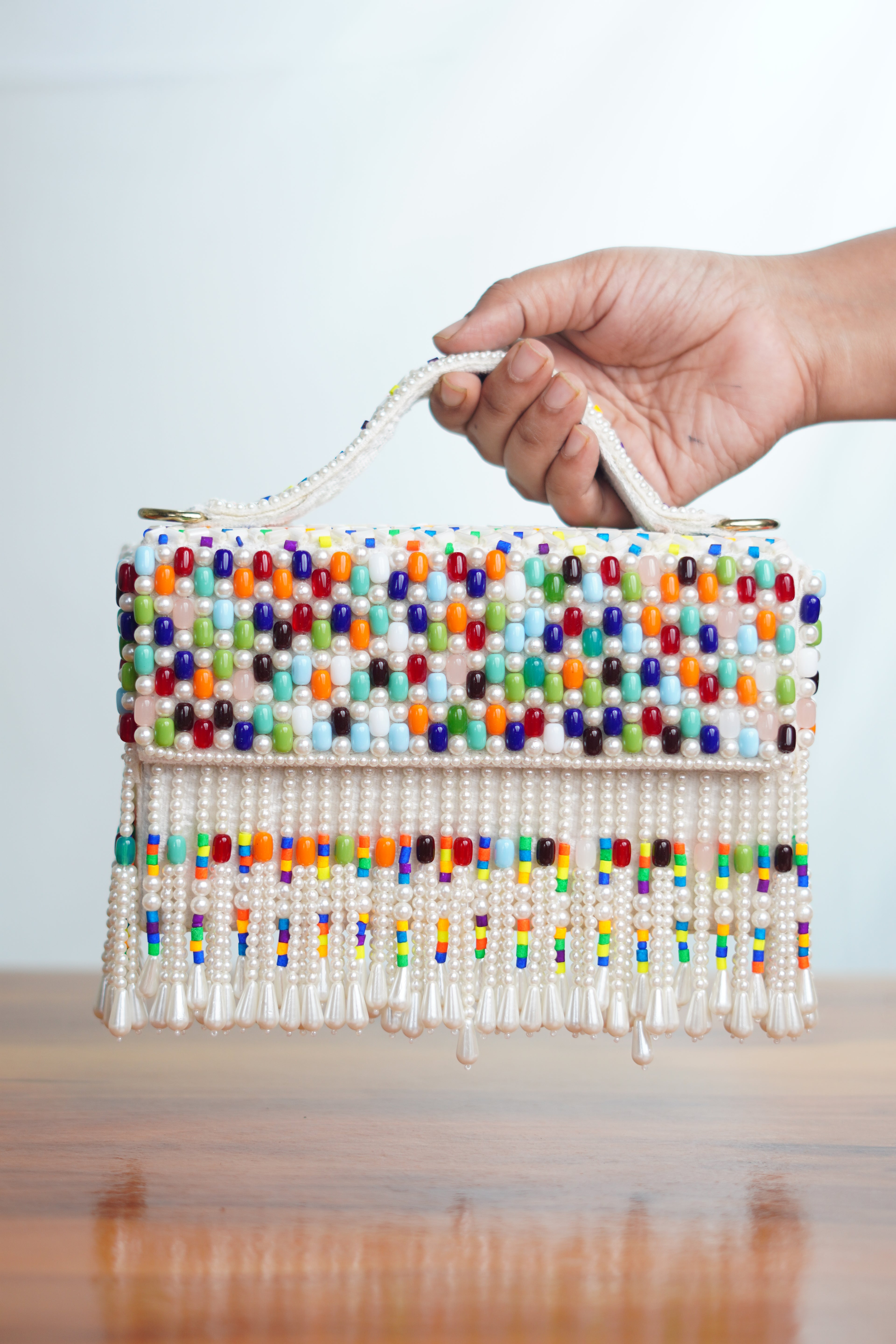 Multicolored white bag  with beaded tassels