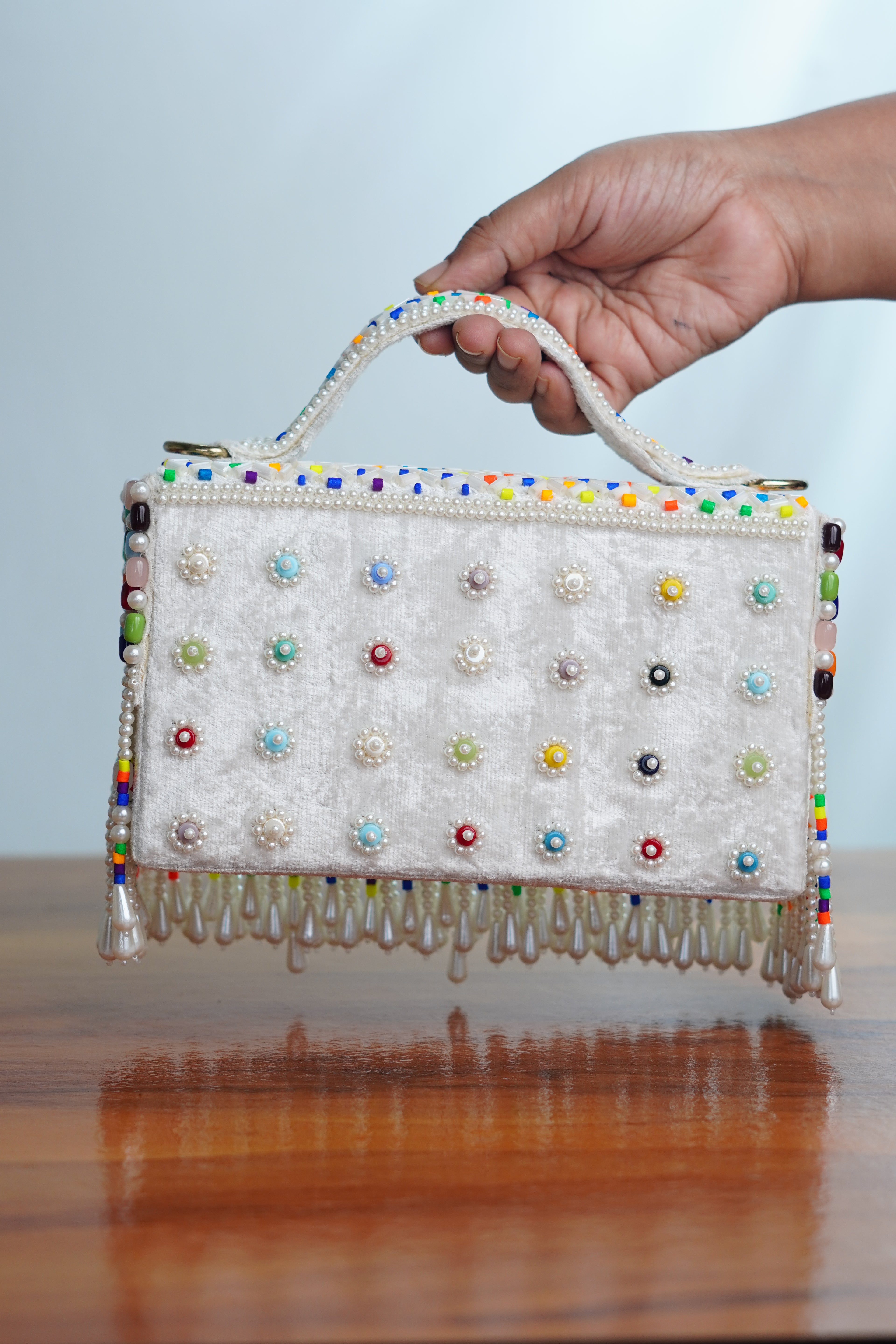 Multicolored white bag  with beaded tassels