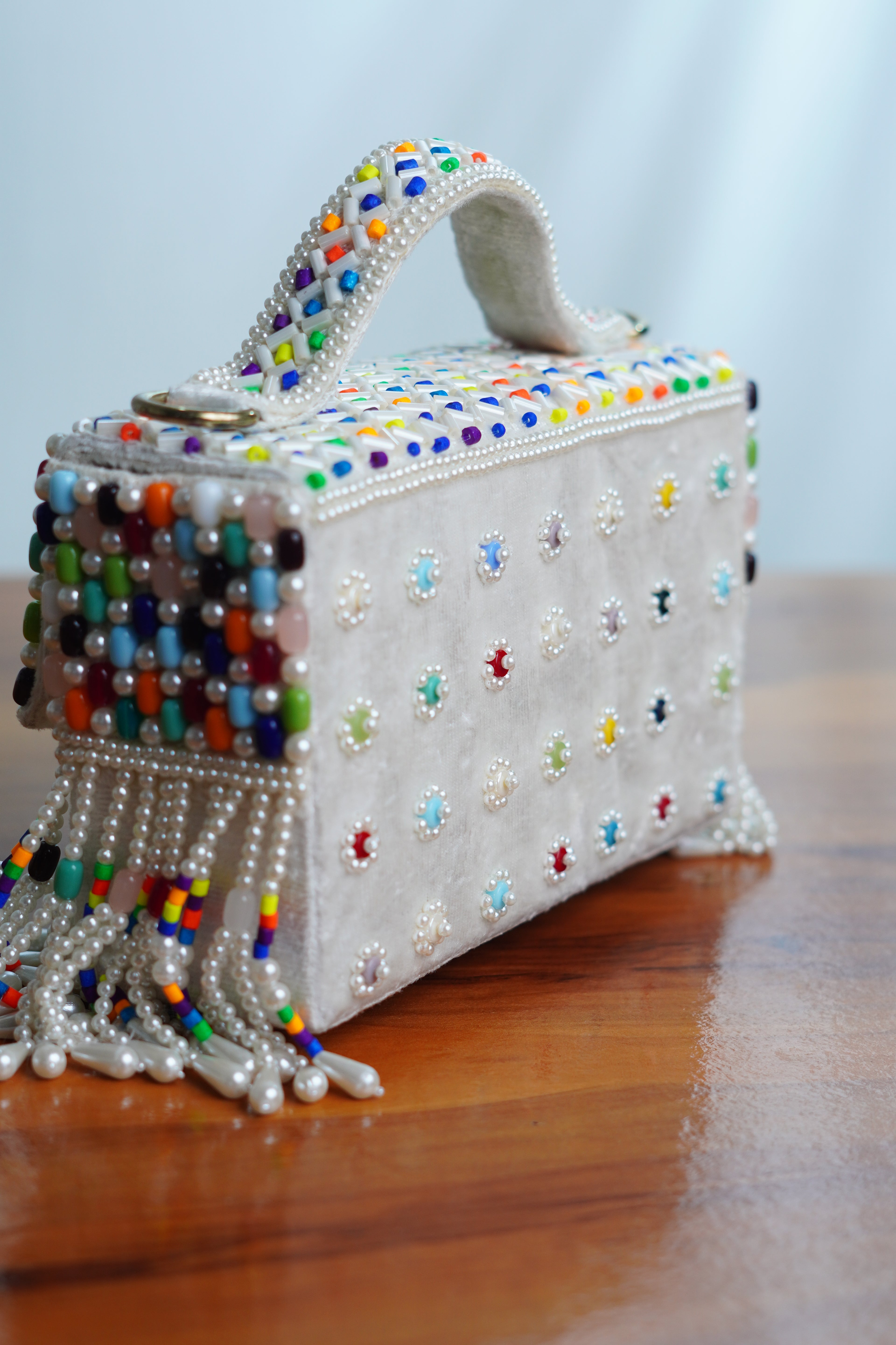 Multicolored white bag  with beaded tassels
