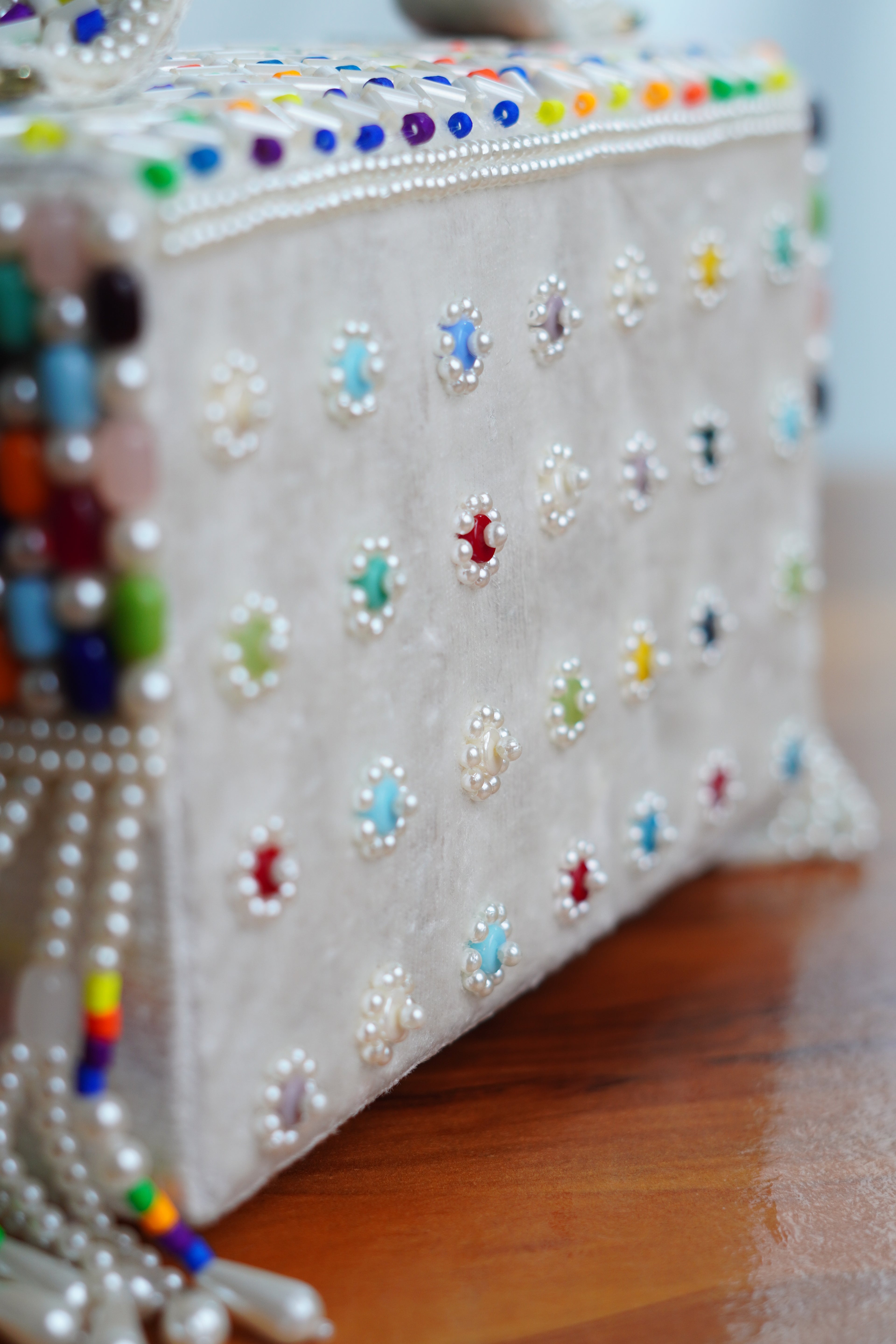 Multicolored white bag  with beaded tassels