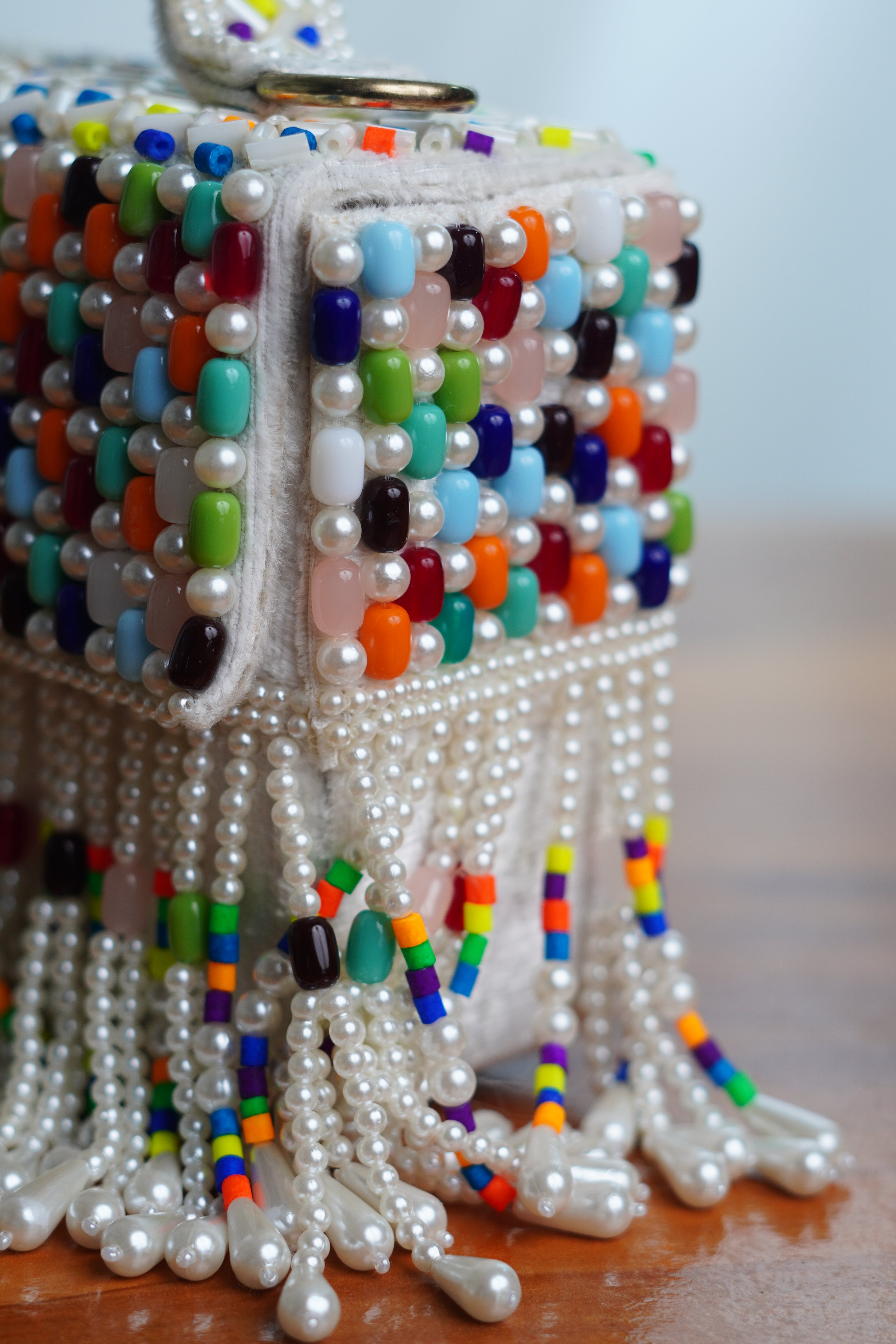 Multicolored white bag  with beaded tassels