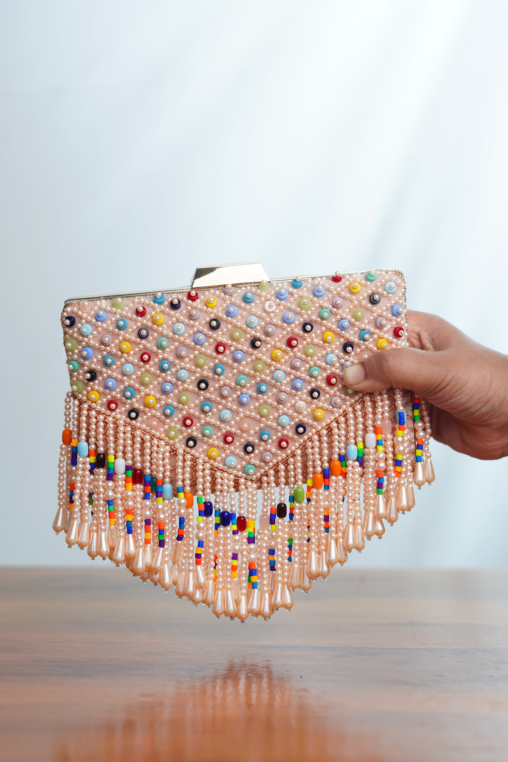 Mutlicolored beaded clutch ,