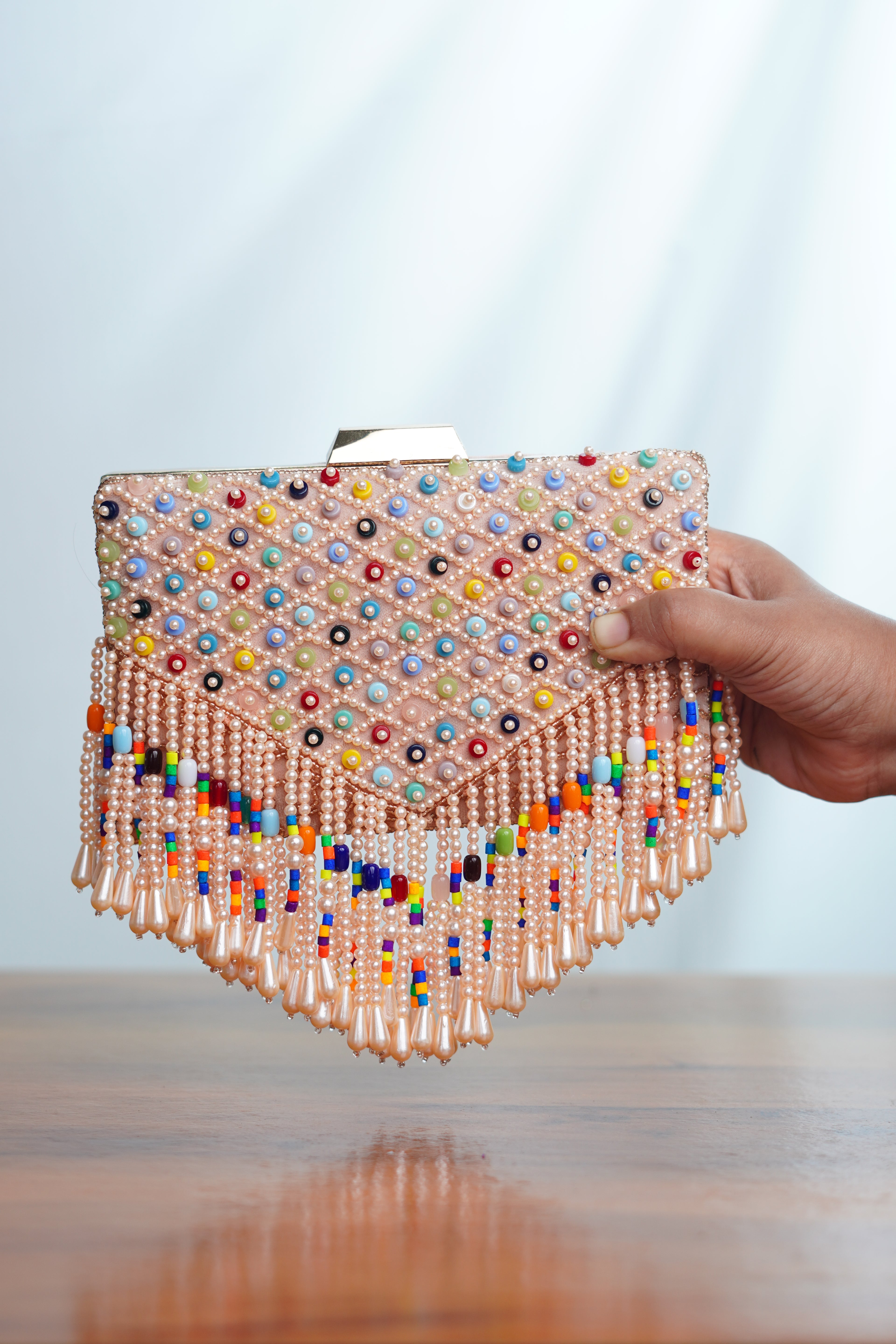 Mutlicolored beaded clutch ,