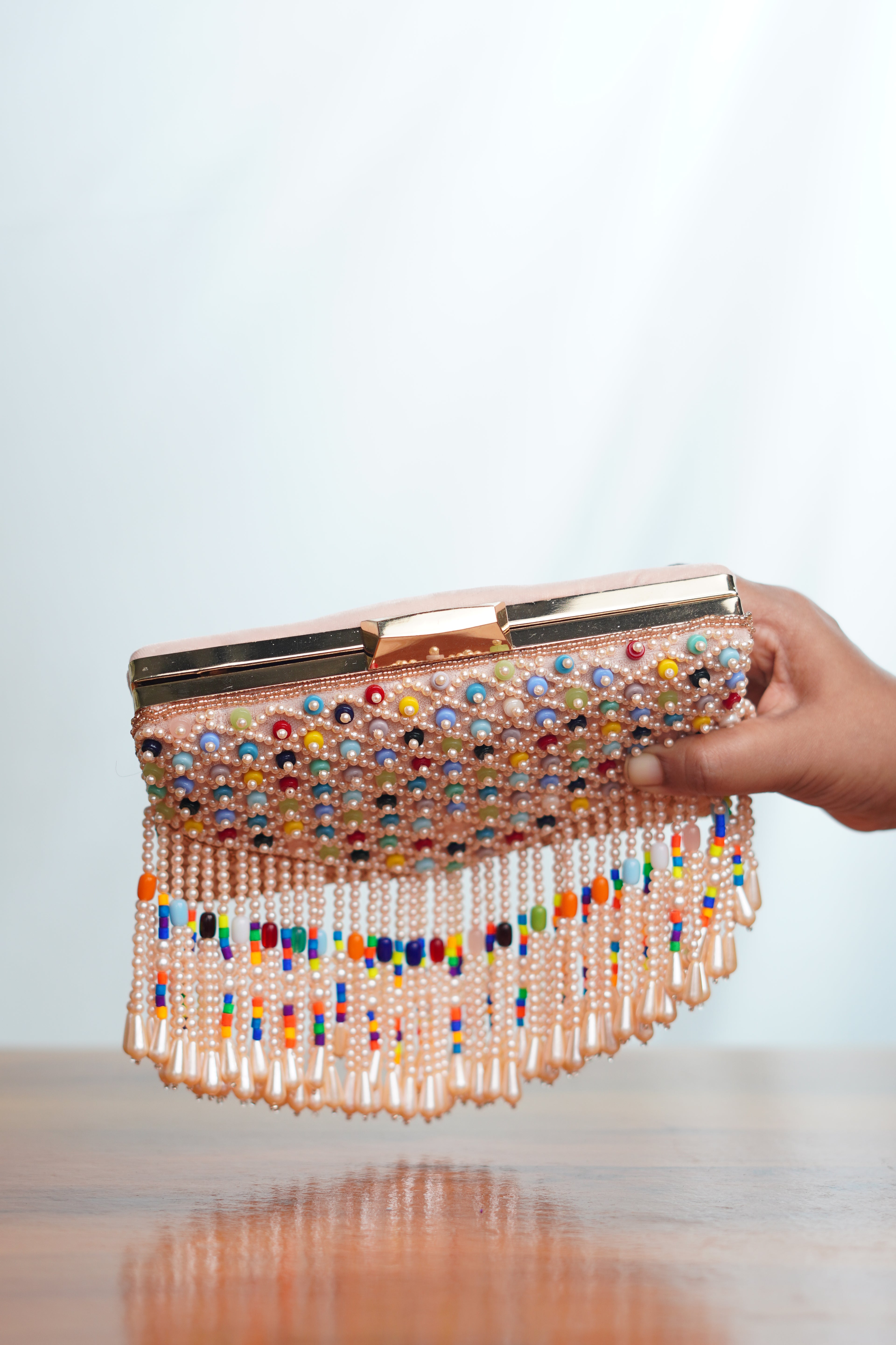 Mutlicolored beaded clutch ,