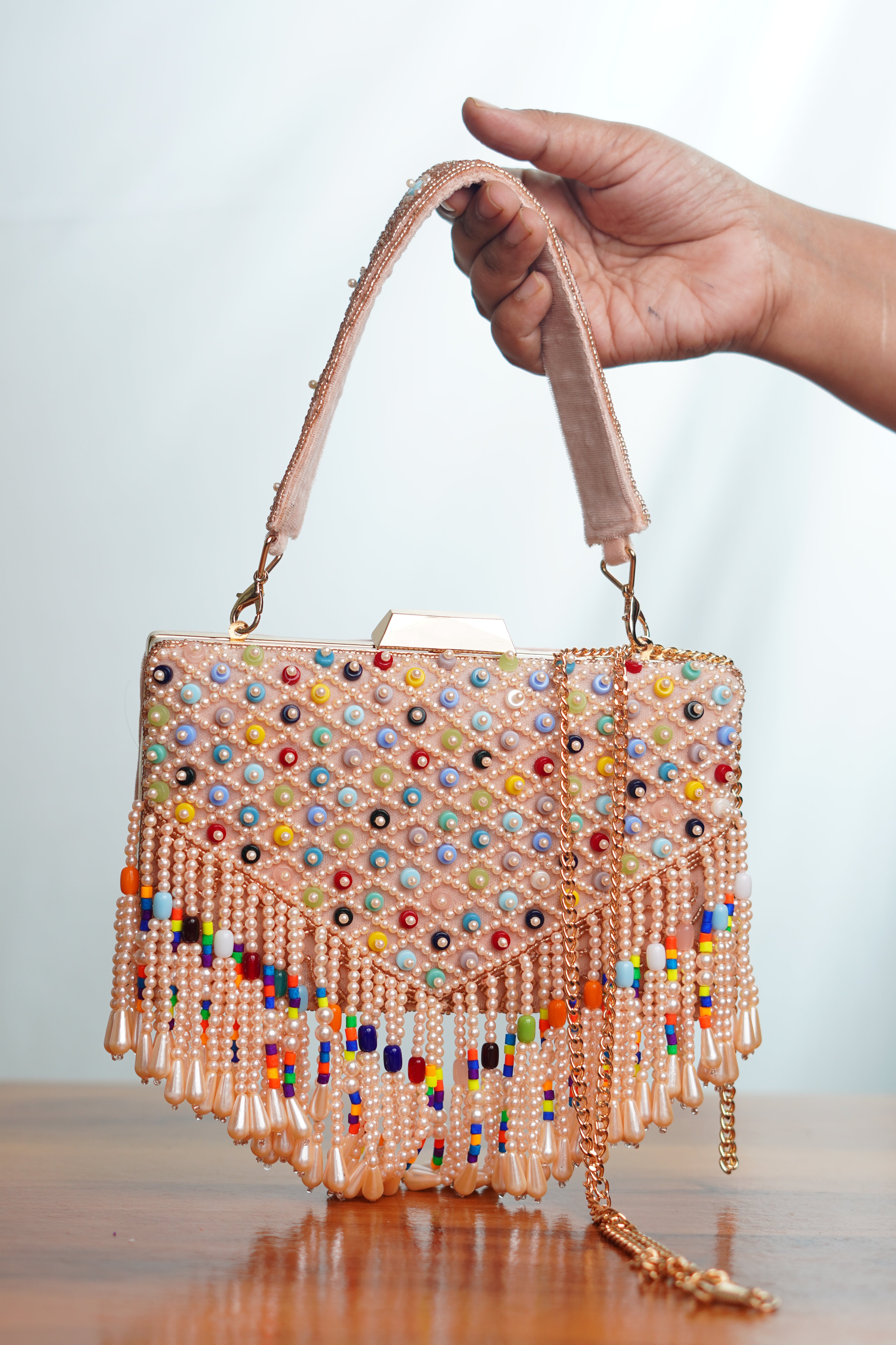 Mutlicolored beaded clutch ,