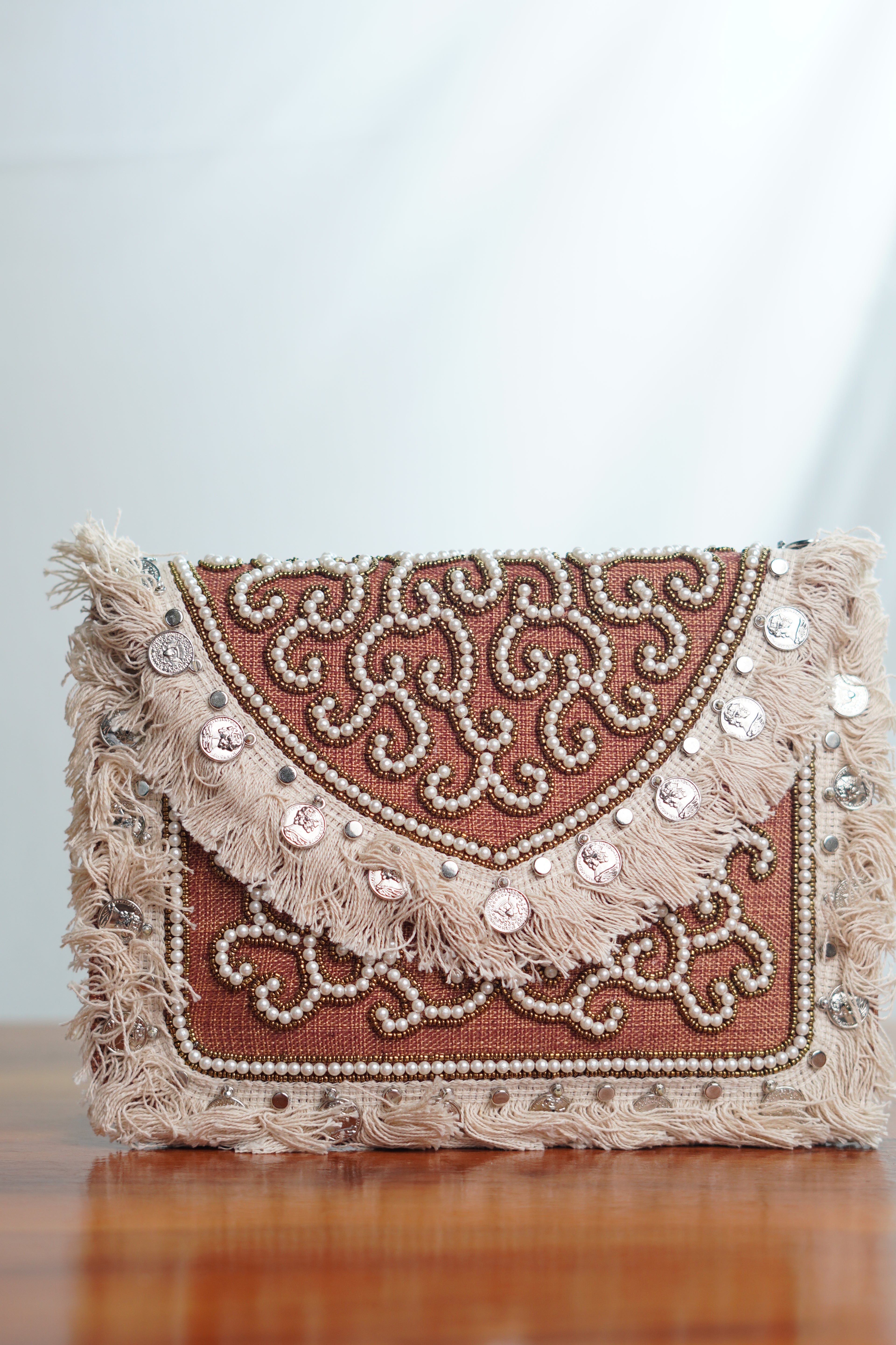 Jute clutch with tassels