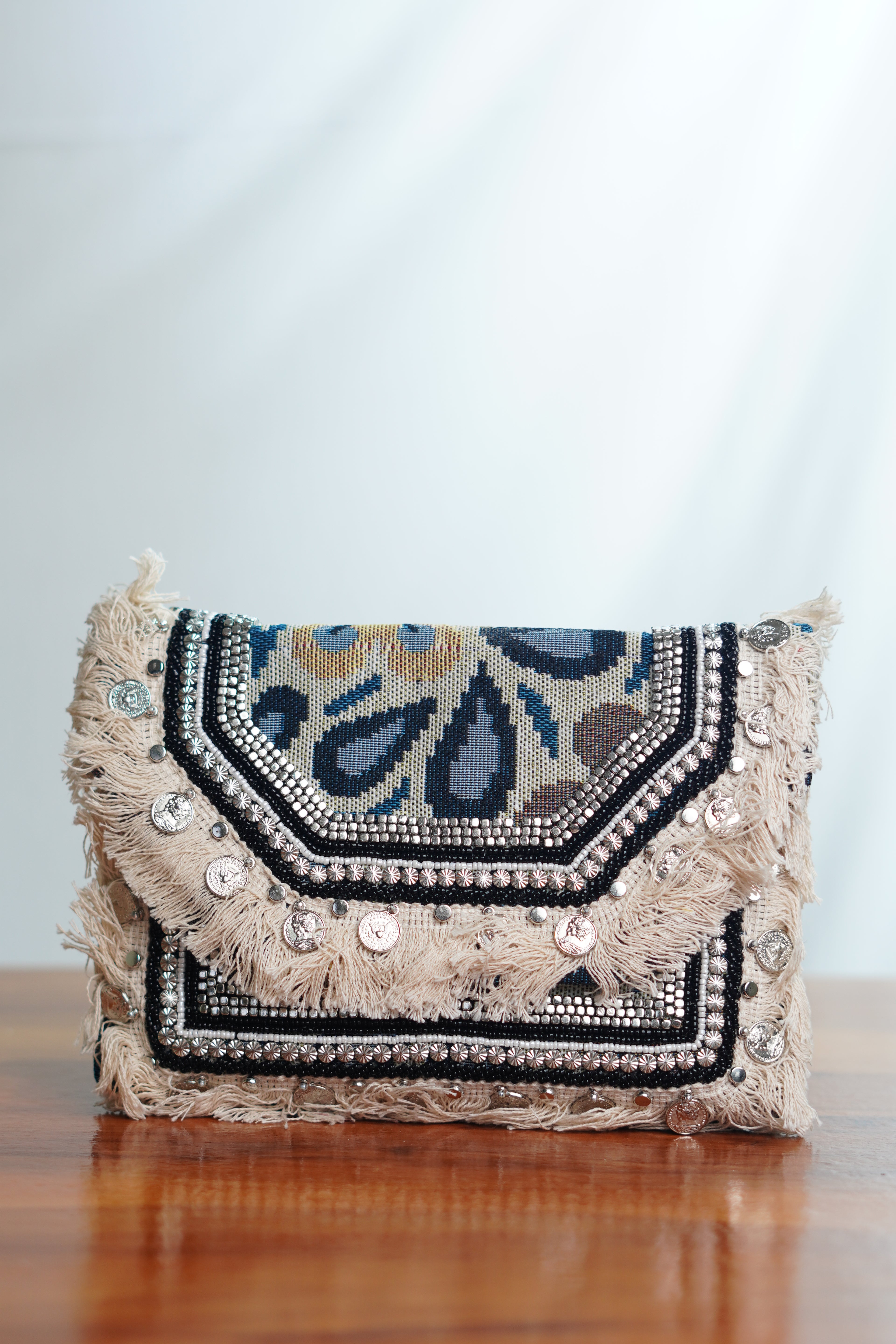 Printed Jute clutch with tassels
