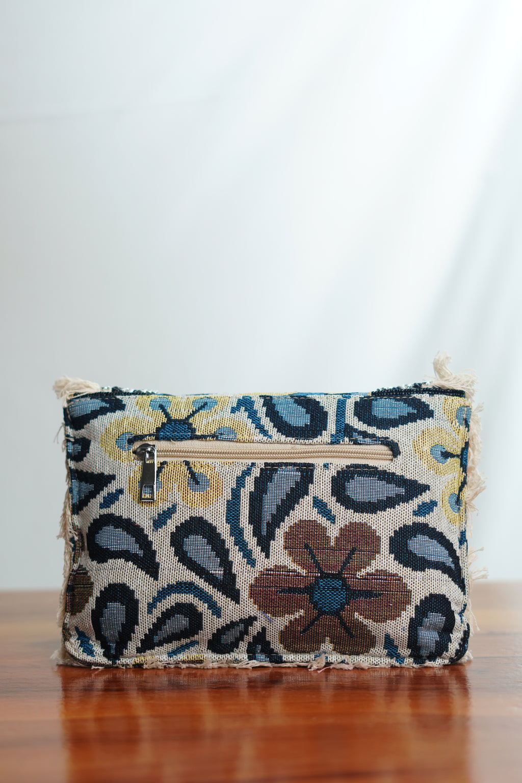 Printed Jute clutch with tassels