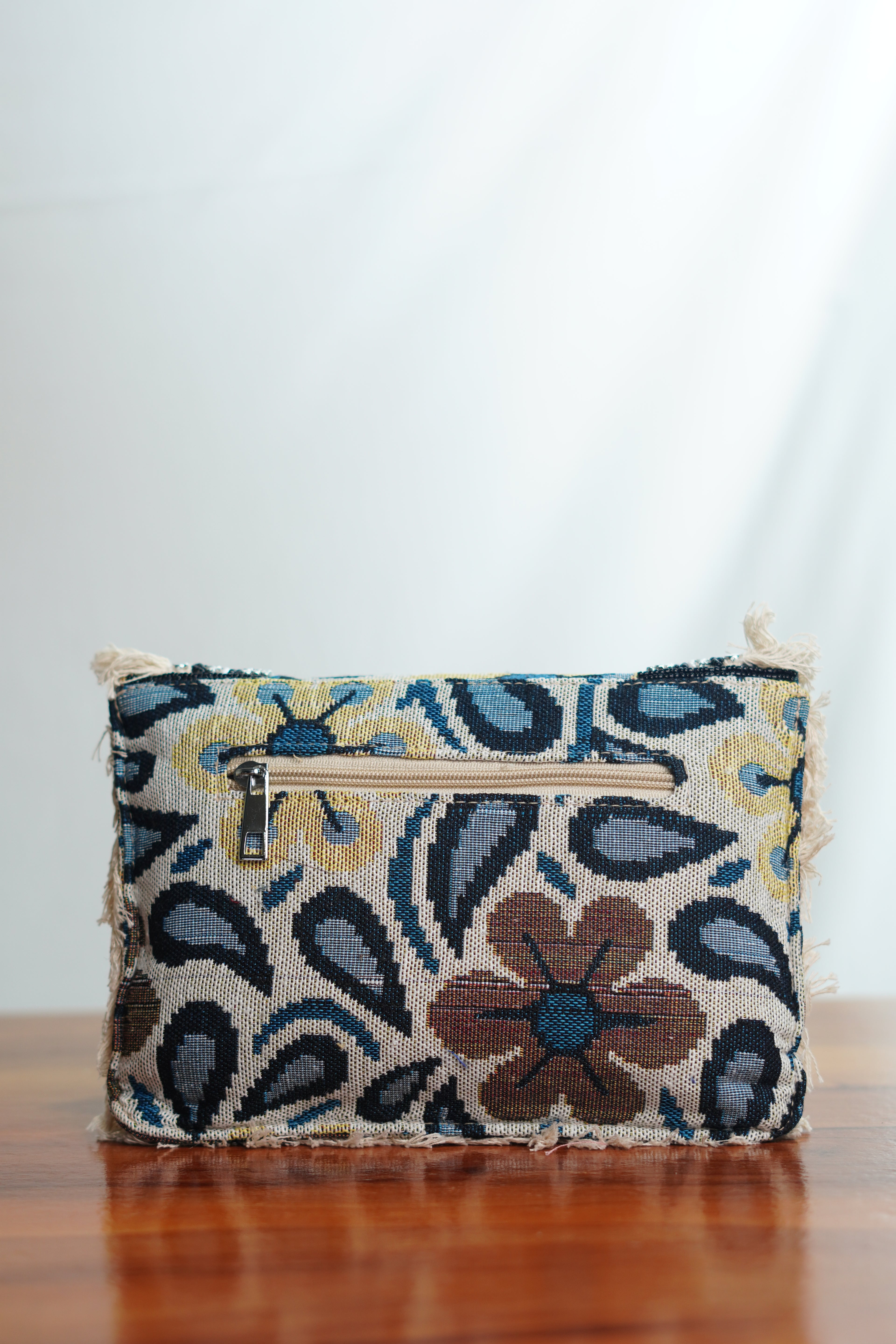 Printed Jute clutch with tassels