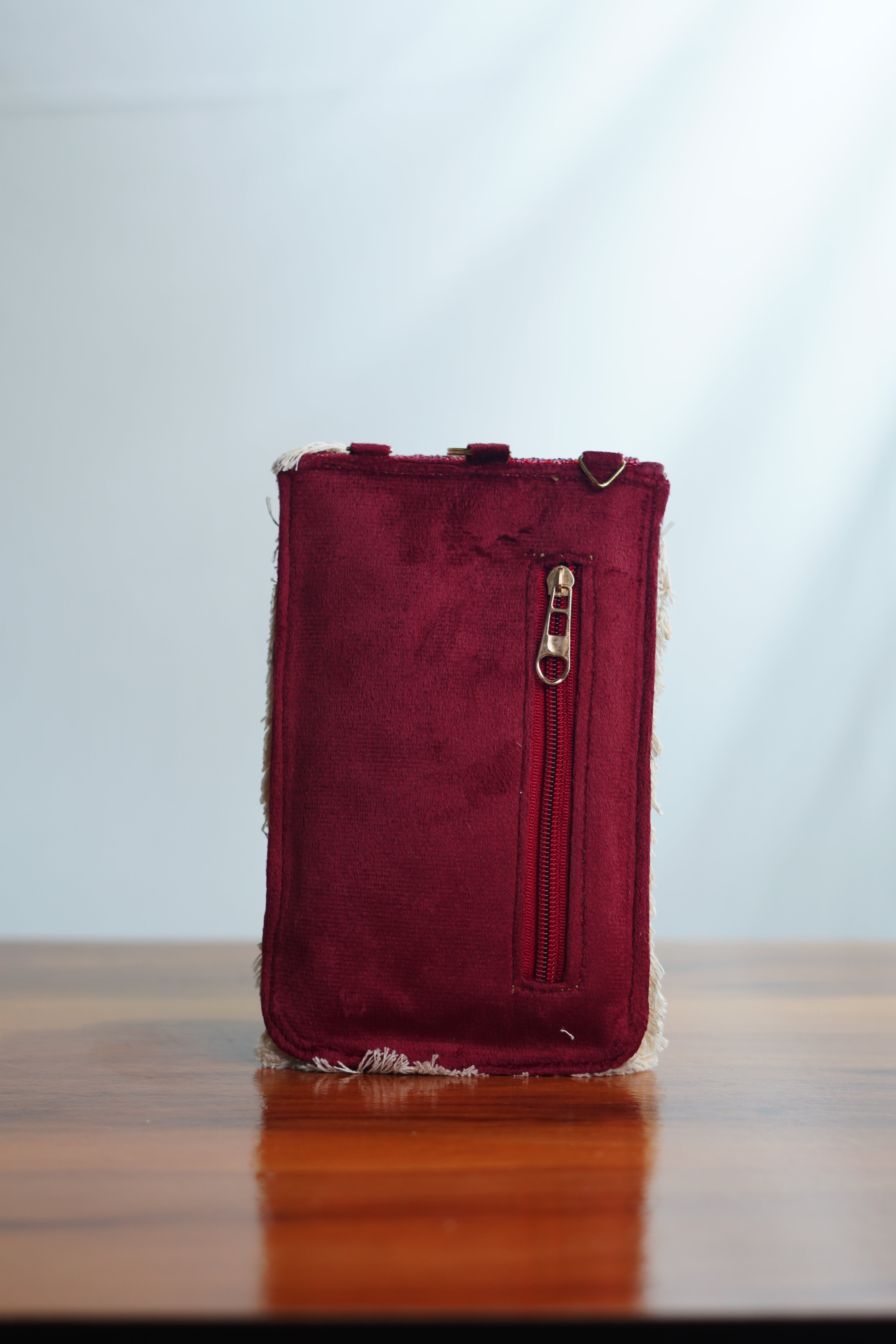 Saree clip mobile pouch with tassels, maroon