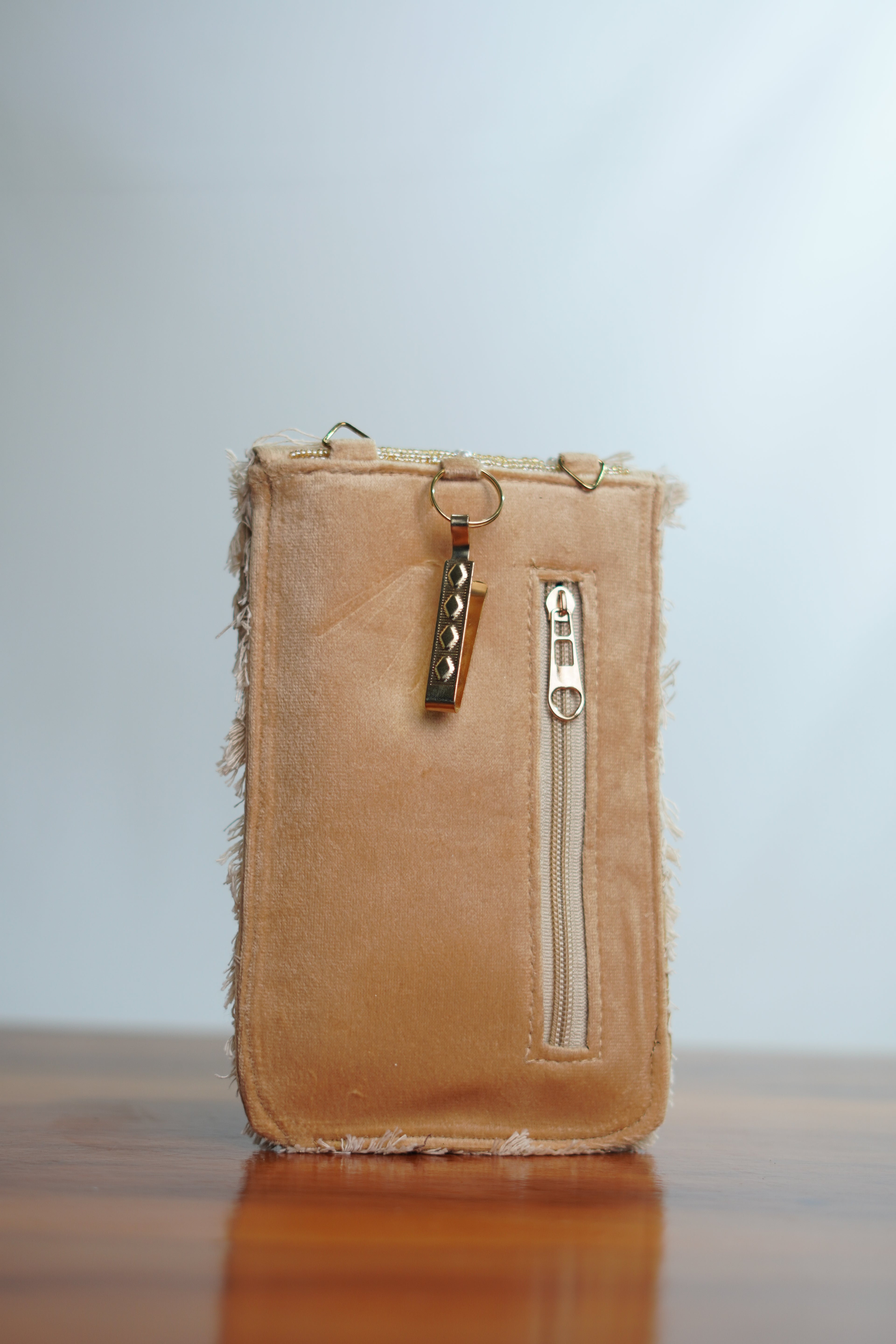 Saree clip mobile pouch with tassels, beige
