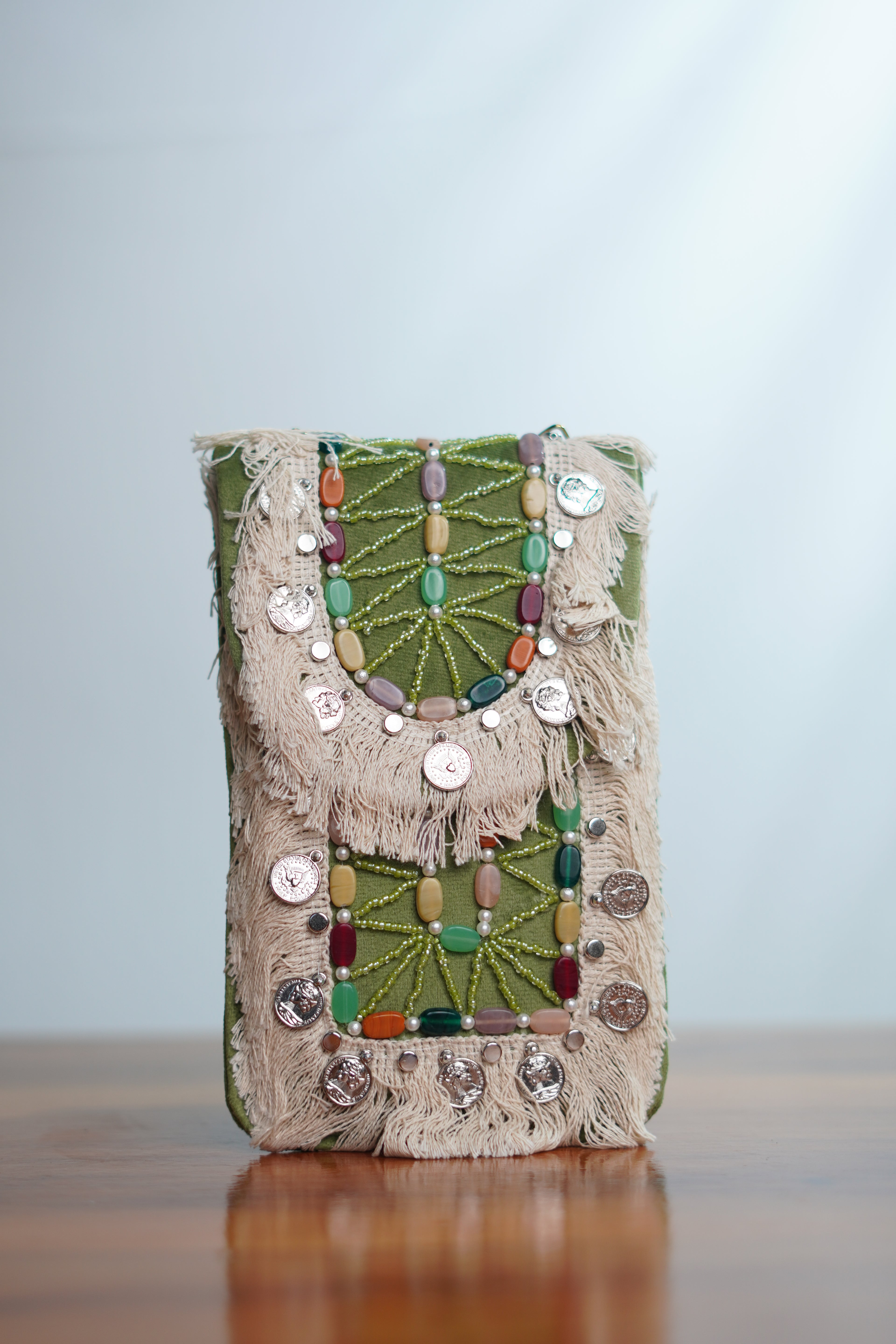 Saree clip mobile pouch with tassels, green