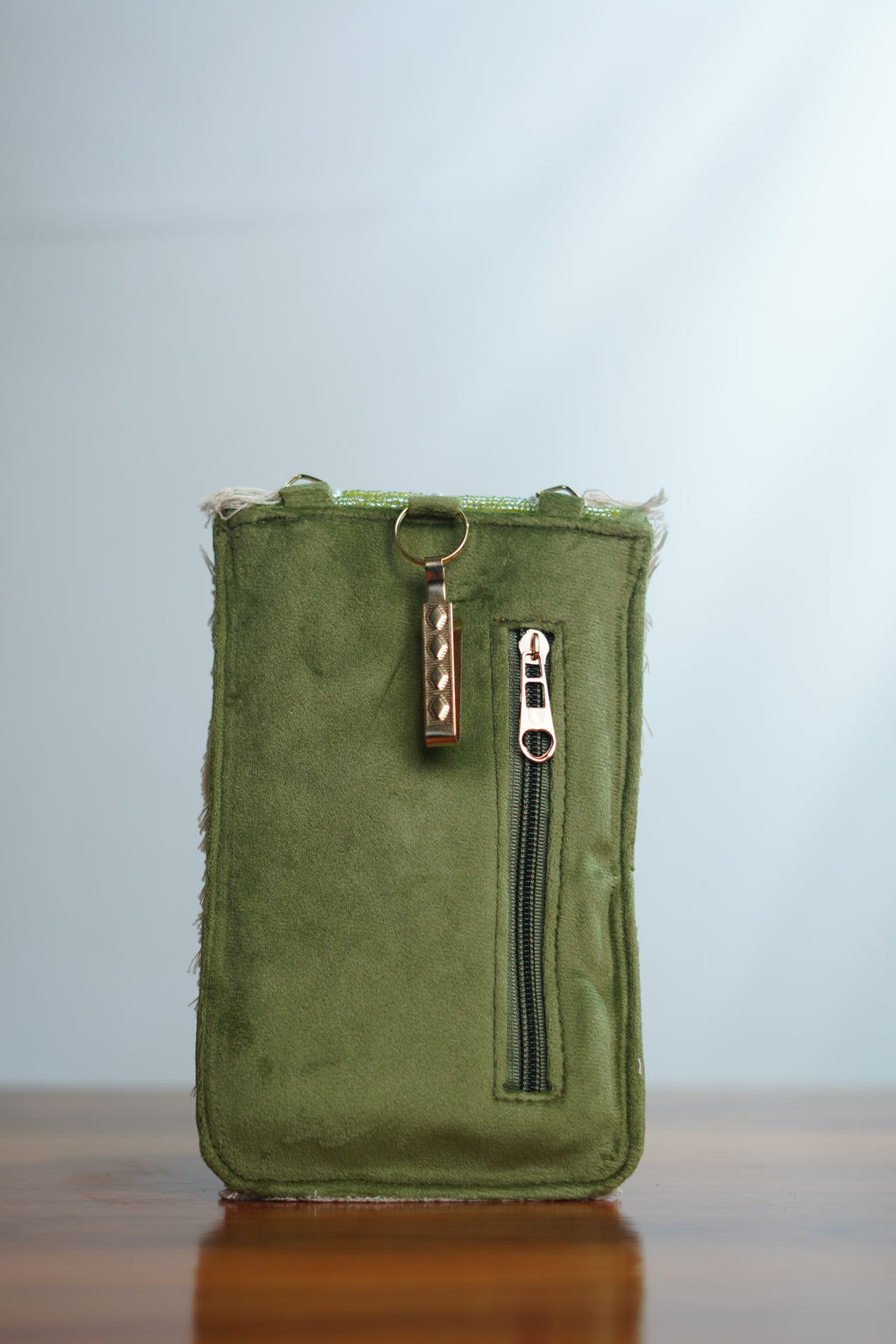Saree clip mobile pouch with tassels, green