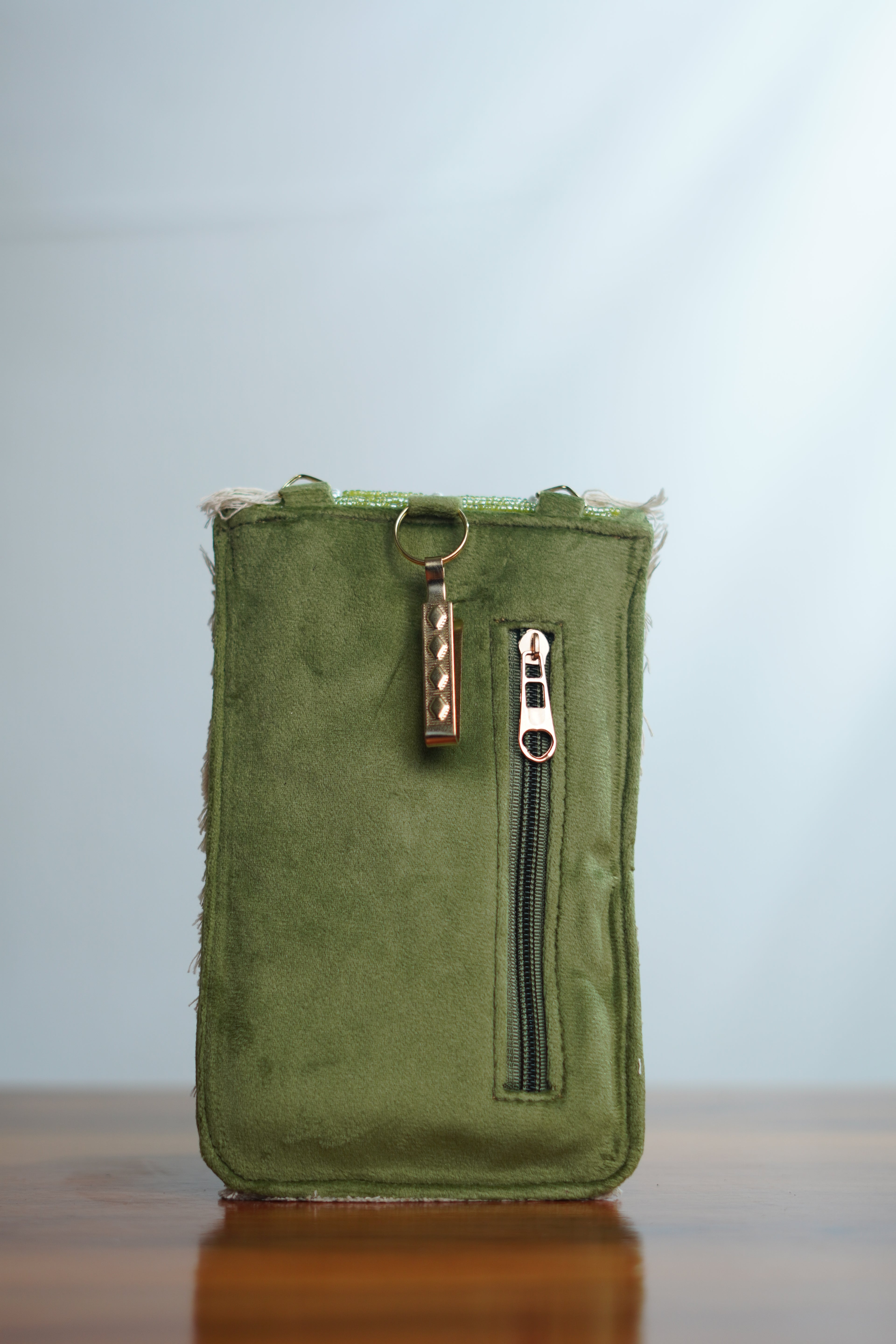 Saree clip mobile pouch with tassels, green