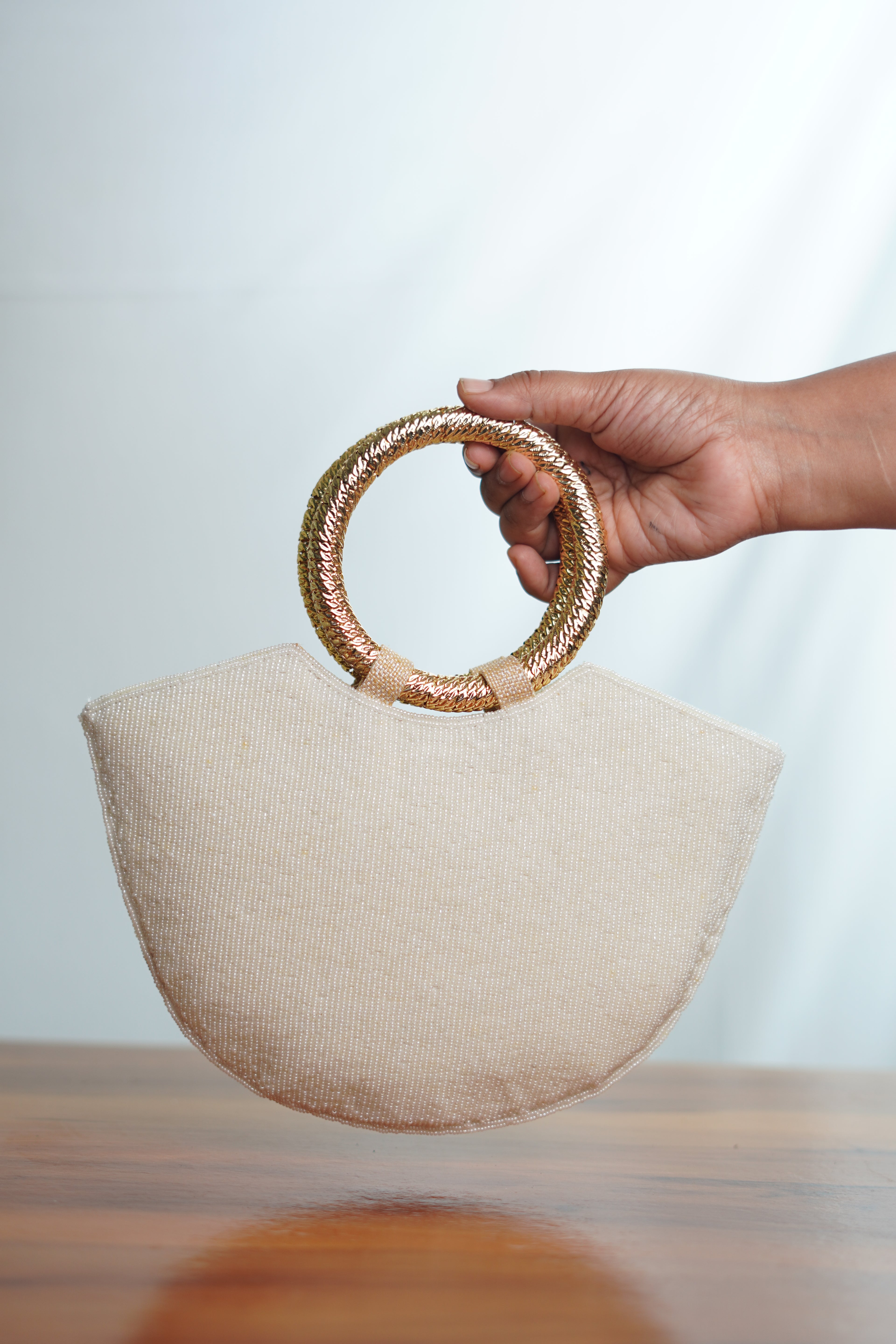 Basket shaped gold  embellished beige
