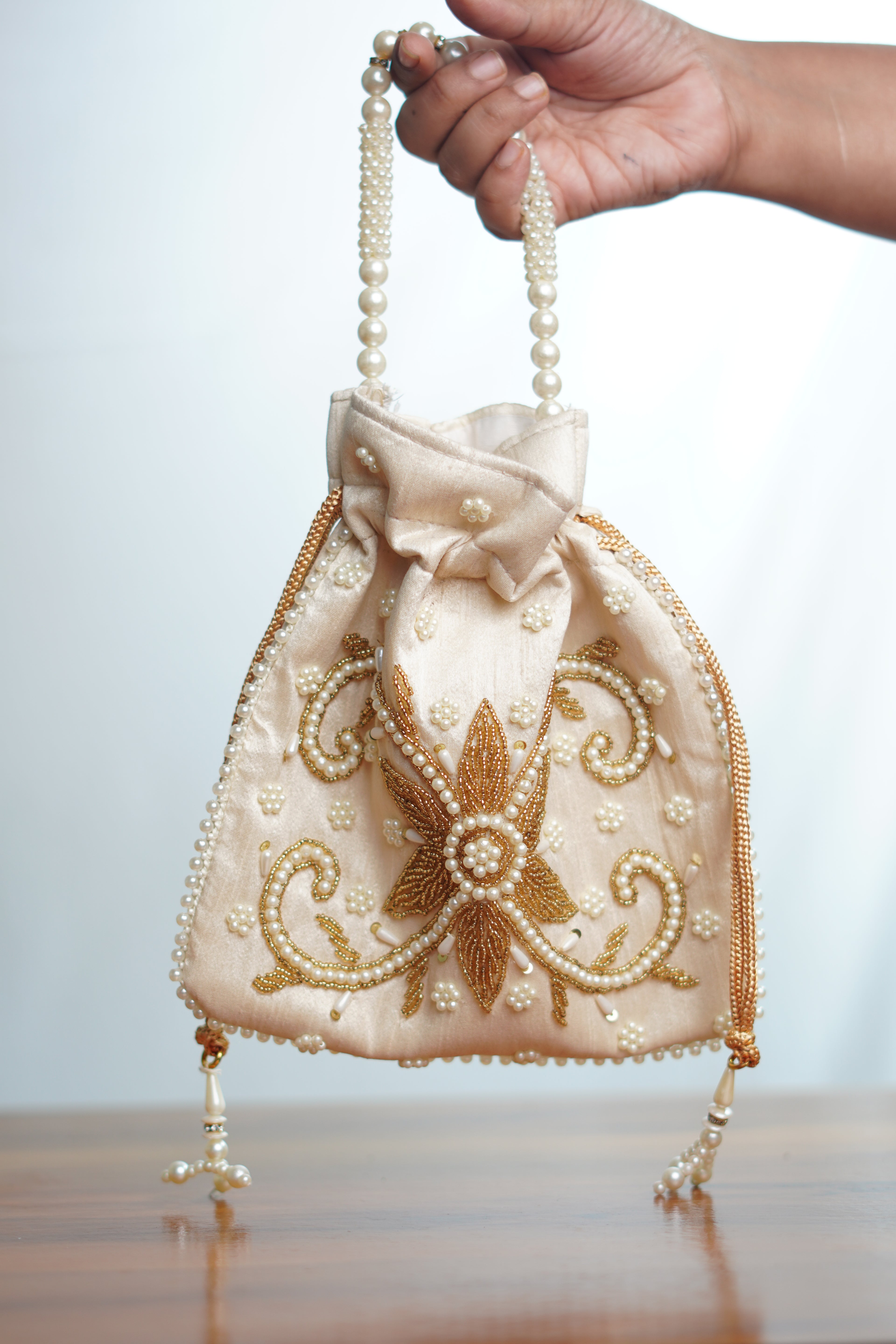 Beige potli bag