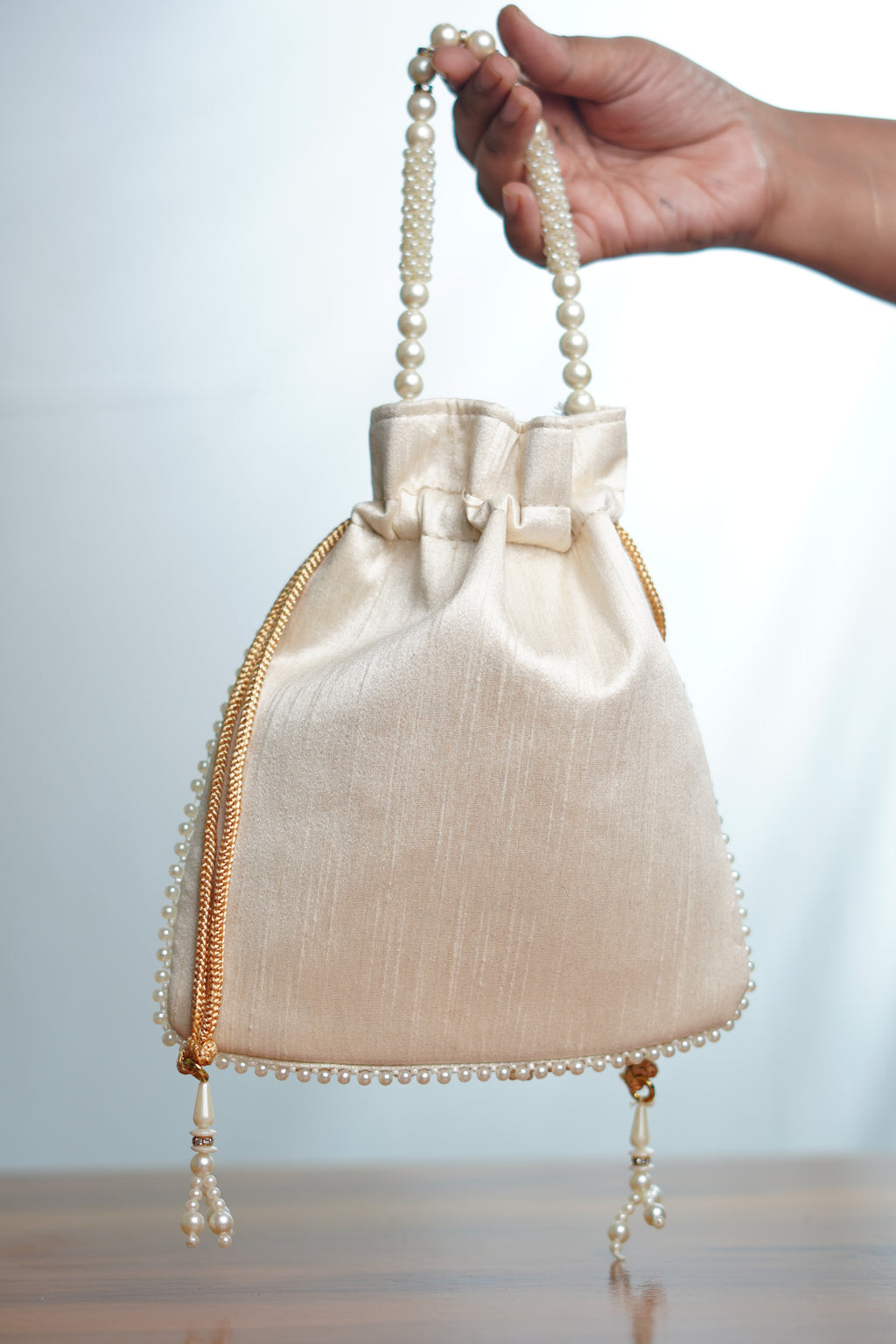 Beige potli bag