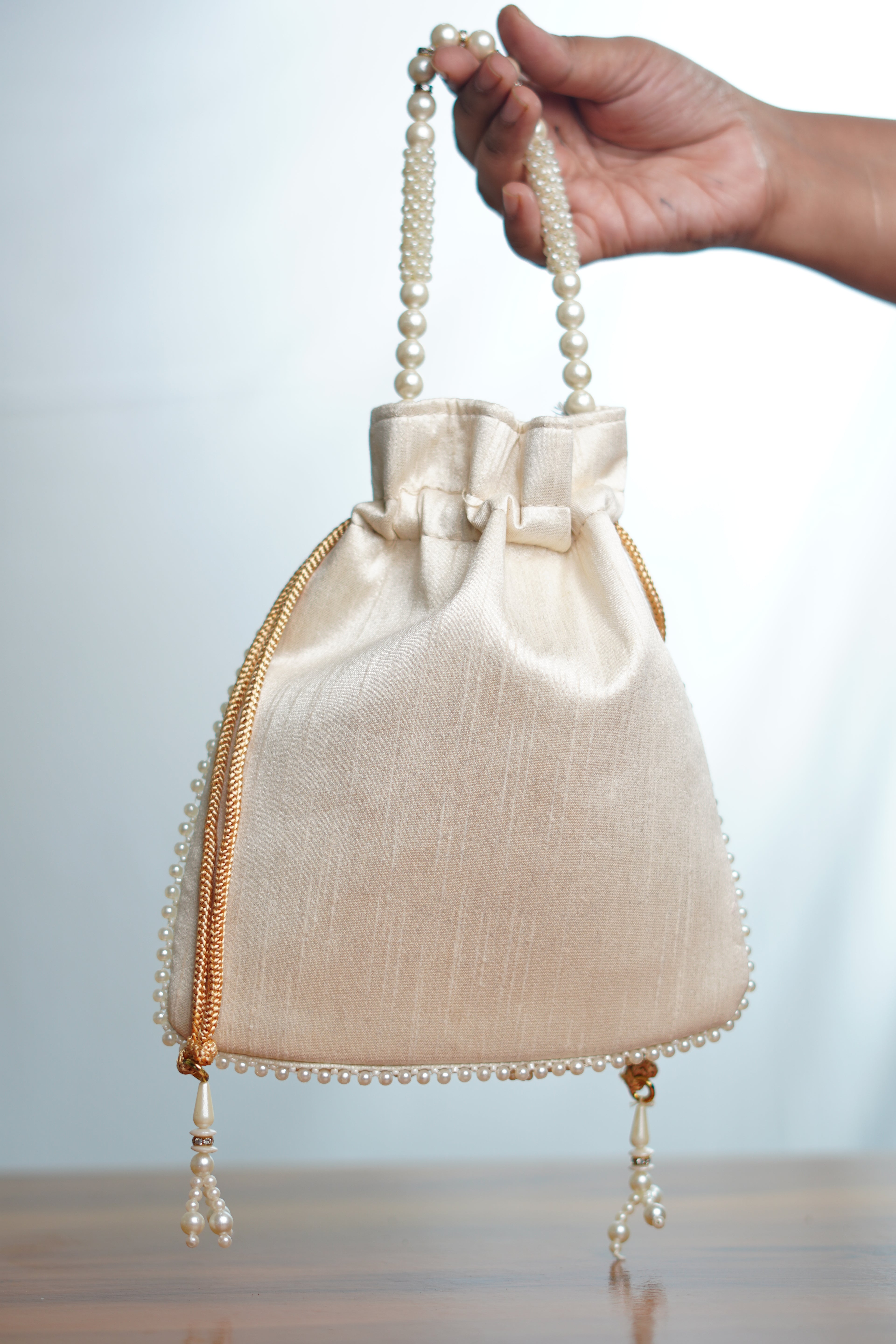 Beige potli bag