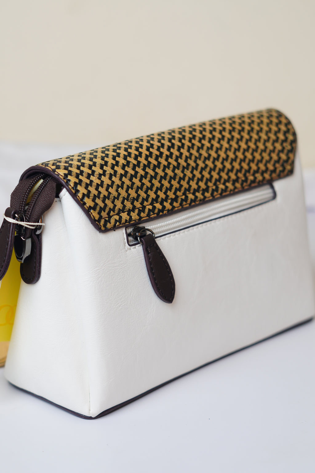 White & brown sling bag