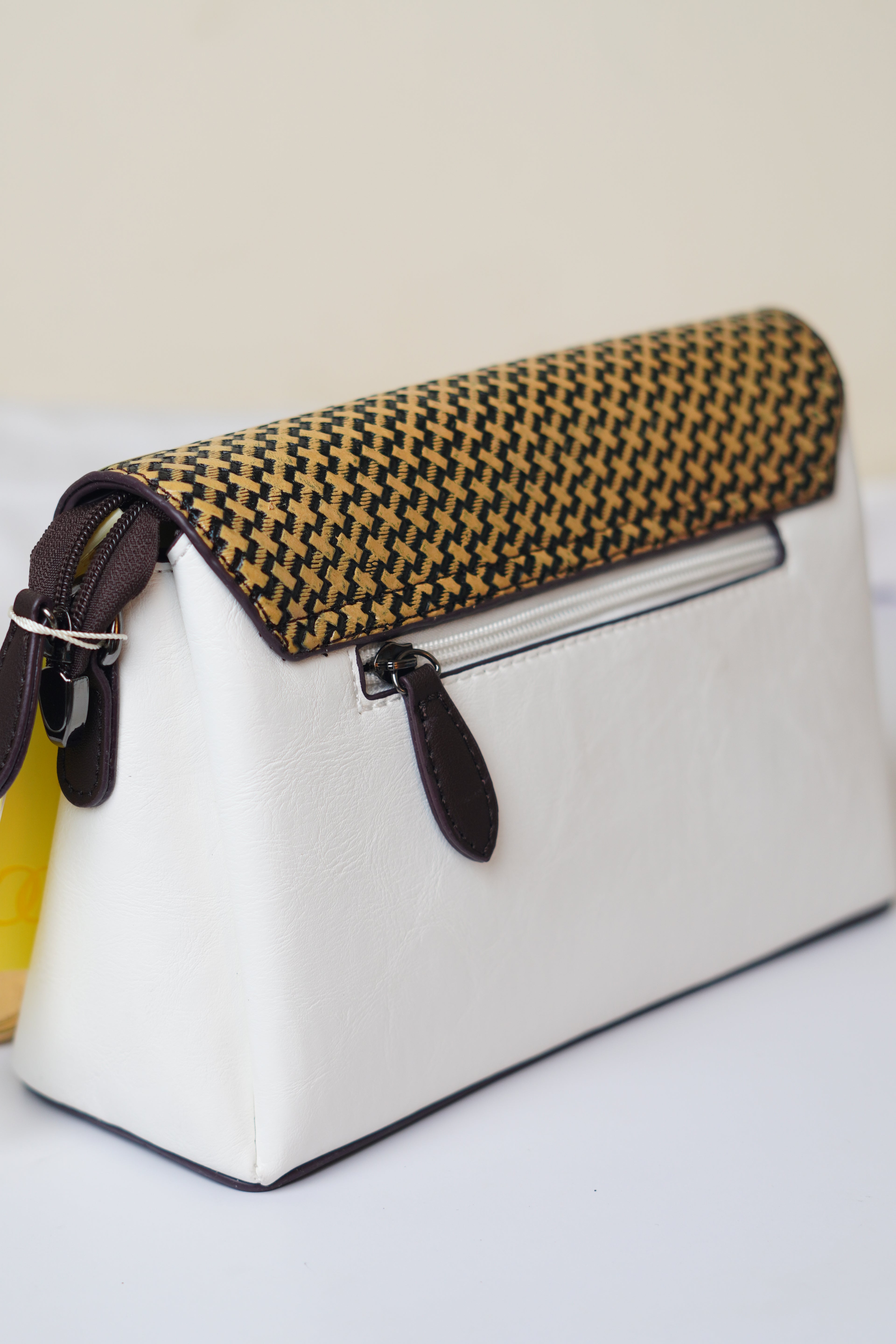 White & brown sling bag