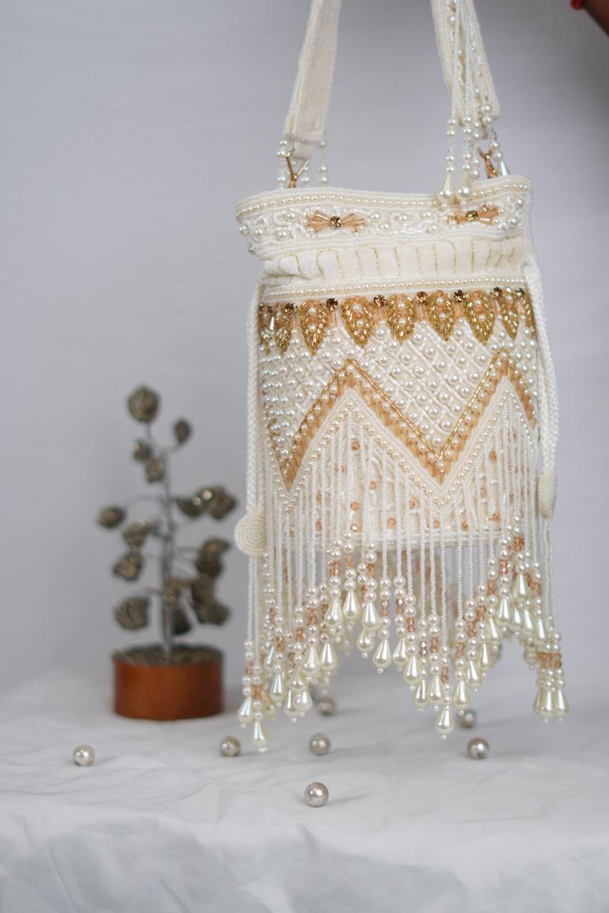 Gold & white Potli with tassels
