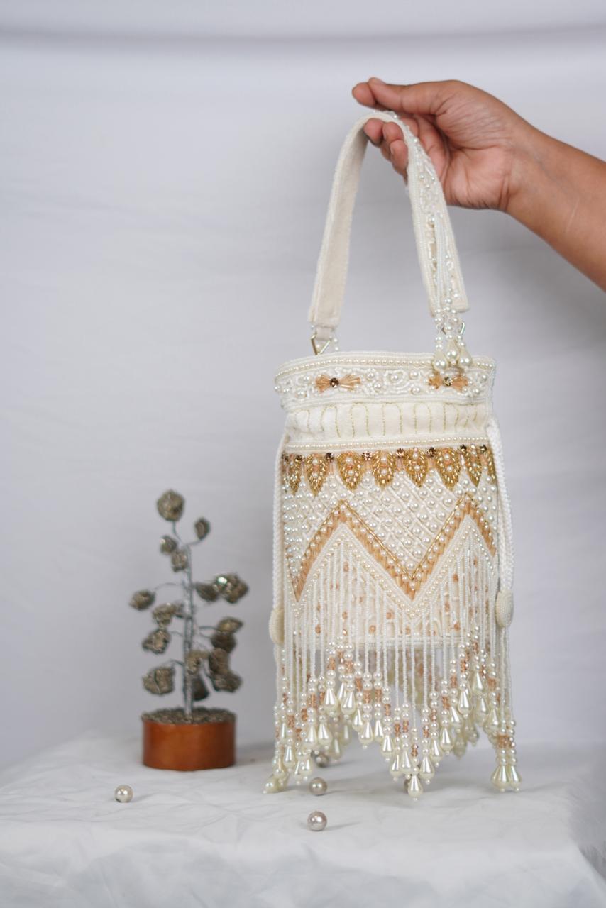 Gold & white Potli with tassels